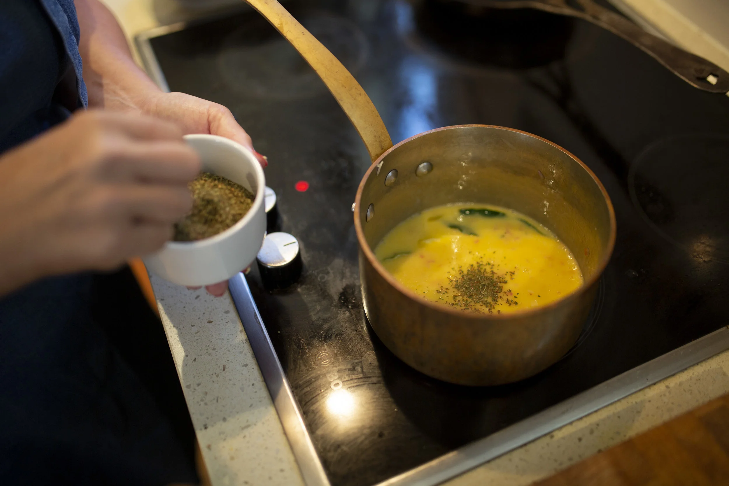 Executive Chef Samantha Gowing cooking up "Crispy Skinned Barramundi with Lemon Myrtle Butter Sauce" at her home in Byron Bay, NSW, Australia. This is the Butter Sauce .Photography : Russell Shakespeare