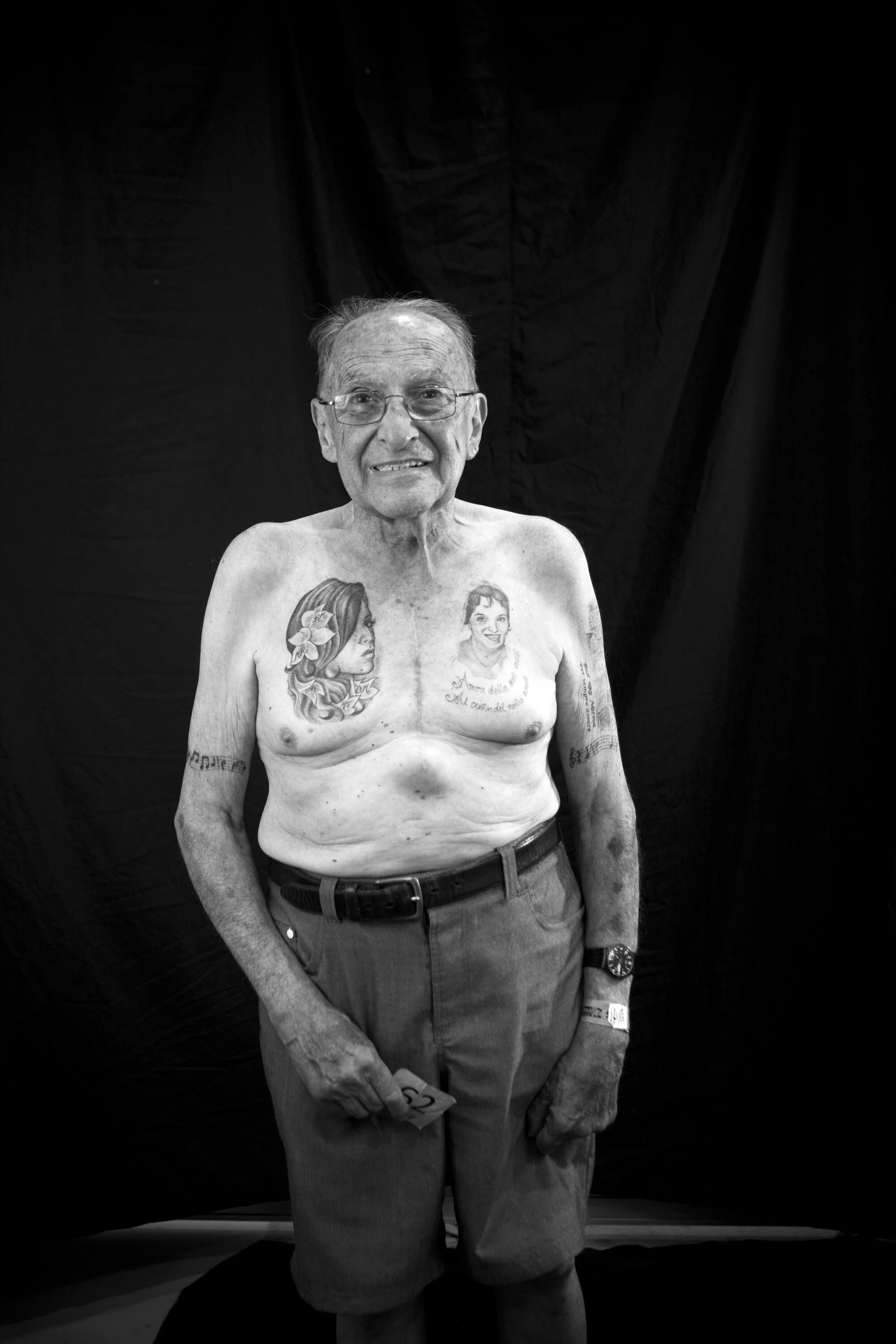  Surf N Ink Tattoo Show, Gold Coast..pictured is Bob Giuffre (80yrs) who has a Tattoo of his wife on his left side of chest, the tatt on the right he has to get modified as his daughters don't like it and want the tattoo to look more like their Mothe
