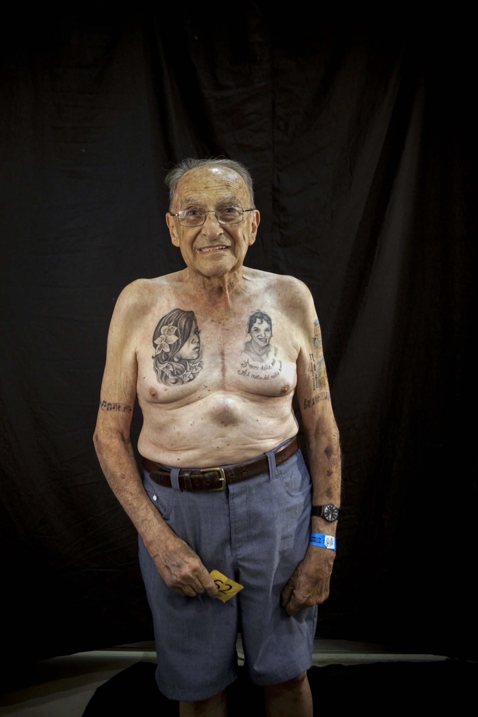  Surf N Ink Tattoo Show, Gold Coast..pictured is Bob Giuffre (80yrs) who has a Tattoo of his wife on his left side of chest, the tatt on the right he has to get modified as his daughters don't like it and want the tattoo to look more like their Mothe