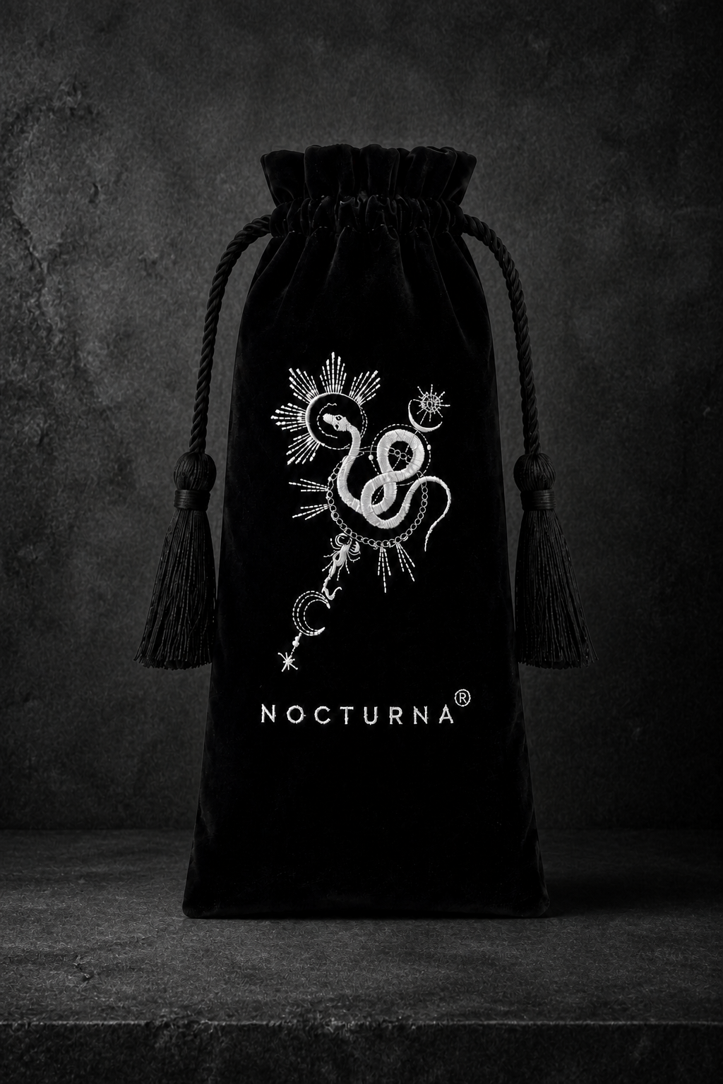 nocturna-empty-velvet-bag-textured-concrete.png