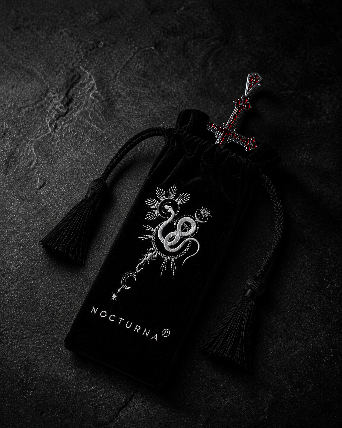 nocturna-velvet-bag-gothic-cross-pendant-rough-concrete-angle-2.png