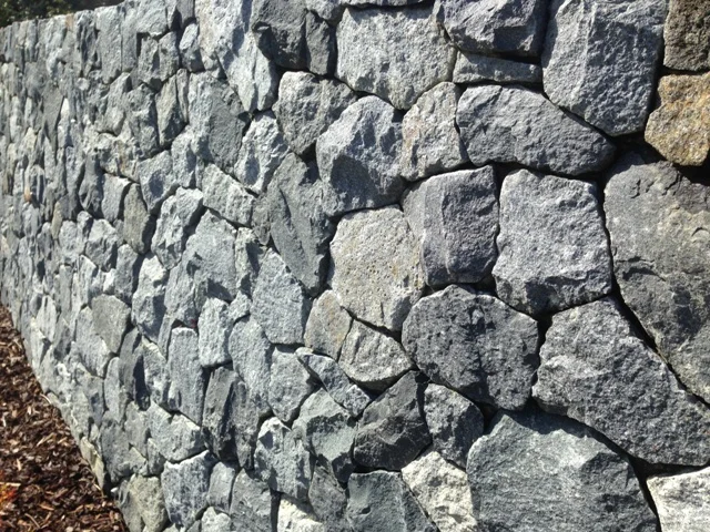 Granite clad block wall