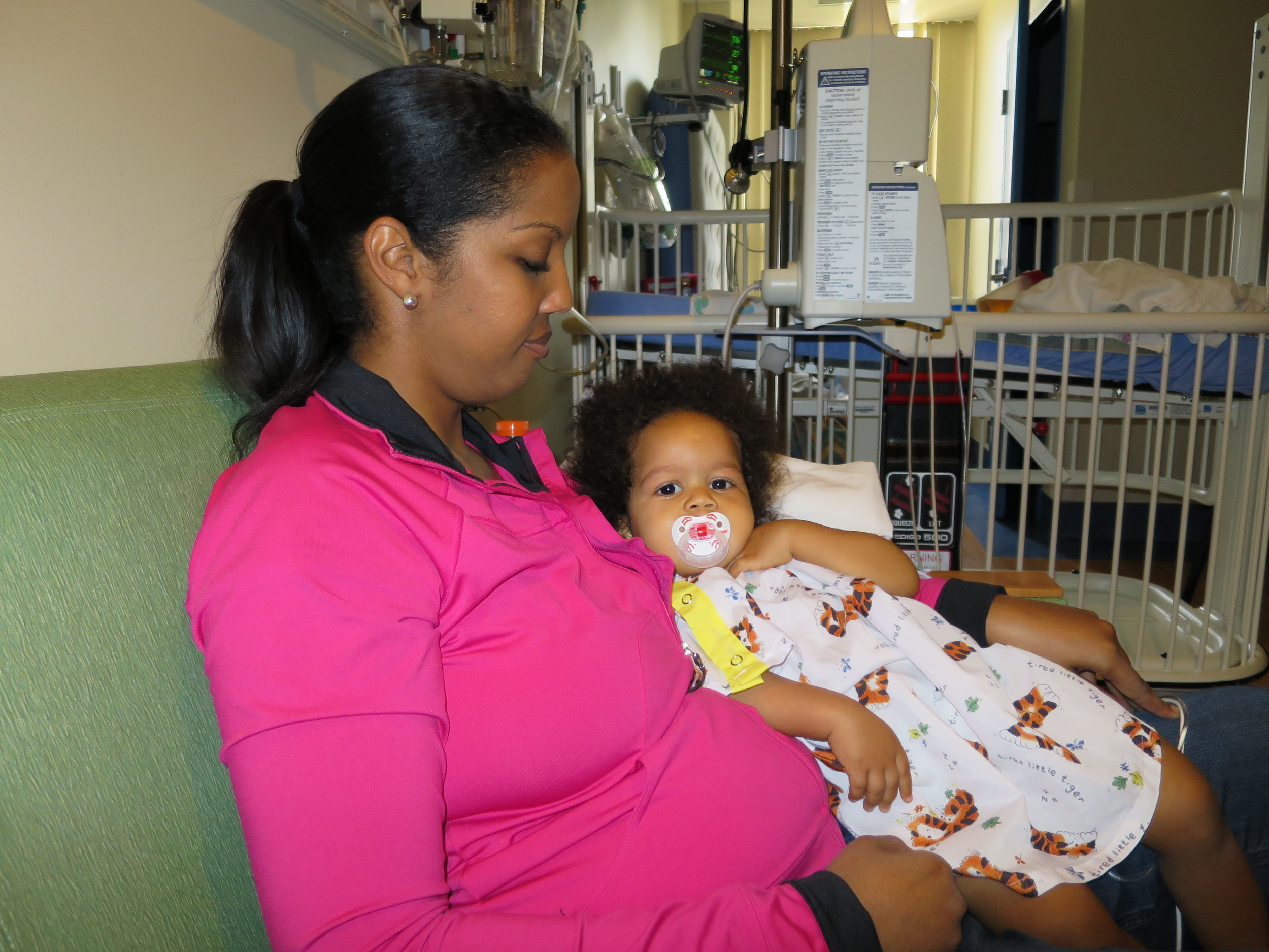 Relaxing with Mommy after surgery