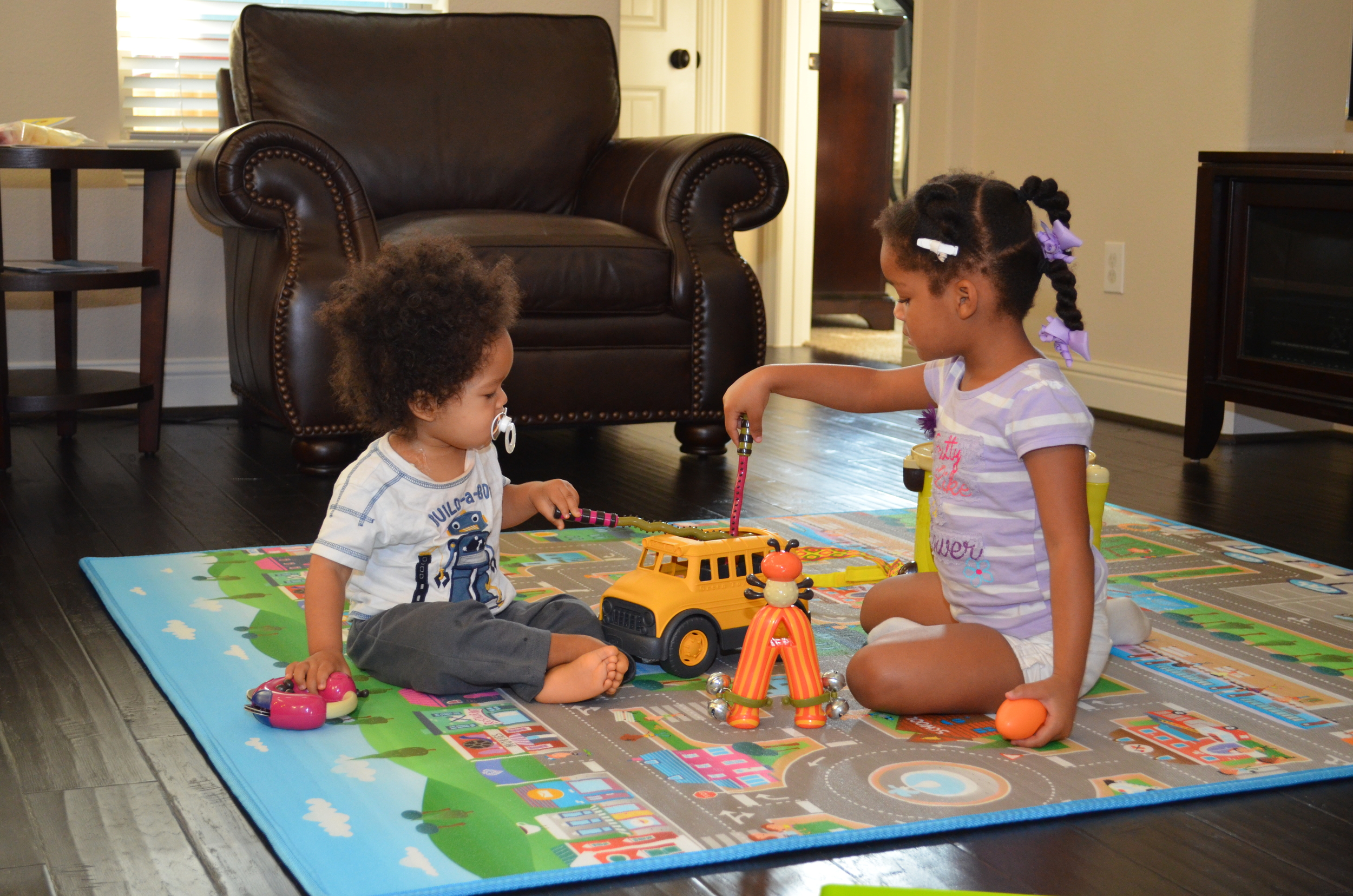 At home playing with big sister