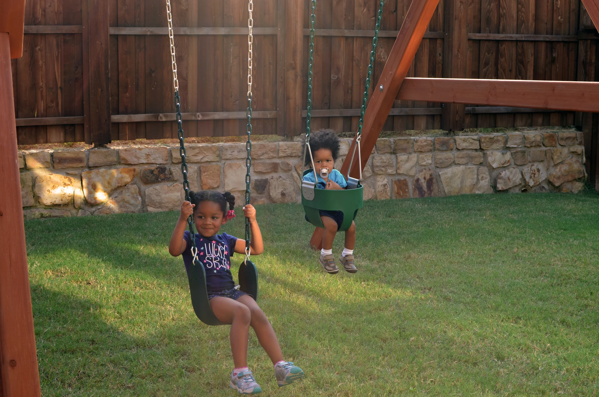 Laurel has fun, while Elliott takes in his surroundings