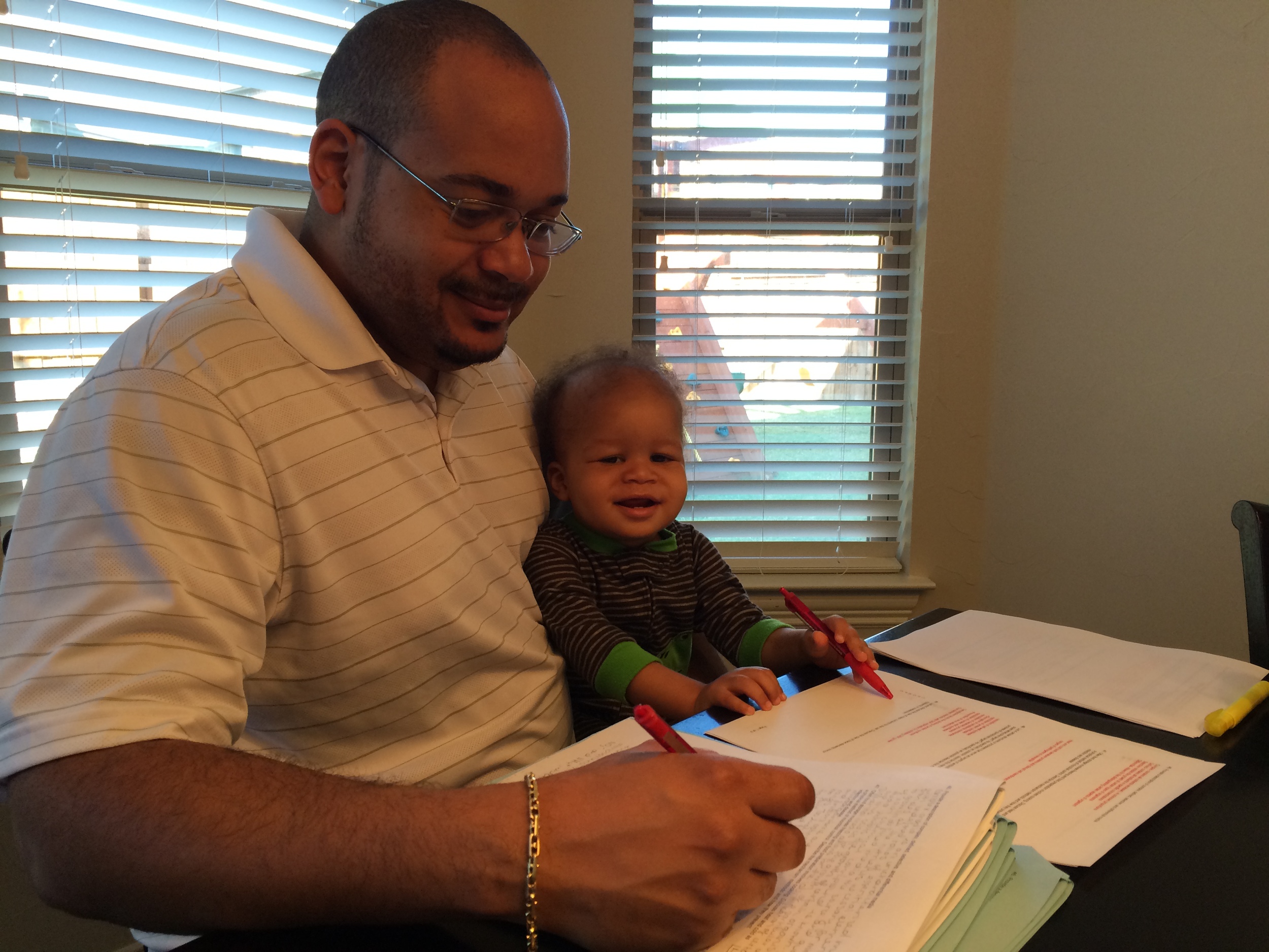 Day 86: Elliott helps me grade exams. I am holding him because he would scream hysterically whenever I would put him down. The jury is still out on him being right or left handed.