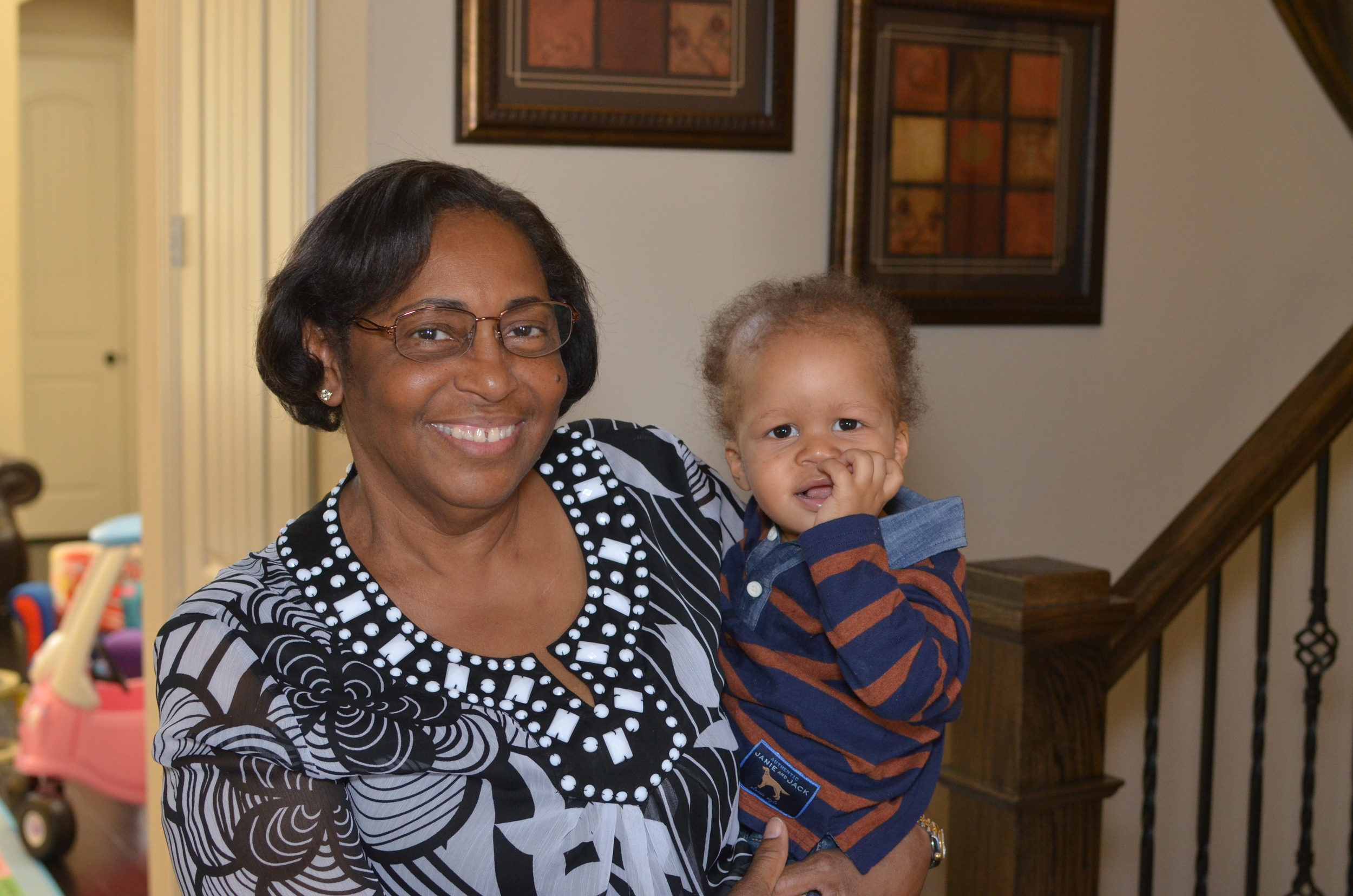 Day 126: My mother gets Elliott ready for Thanksgiving dinner