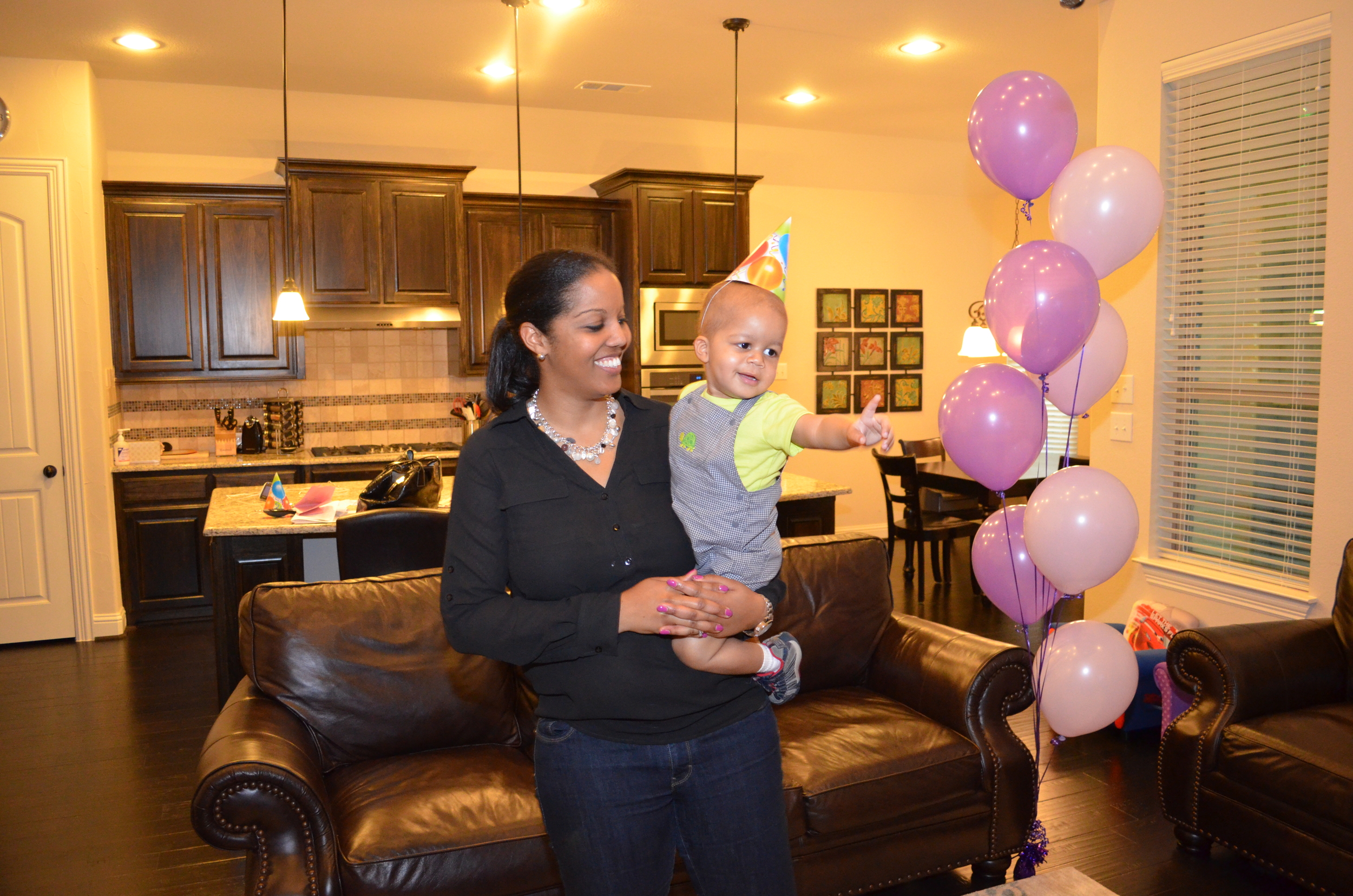 Day 185: Elliott watches as Laurel dances to birthday music