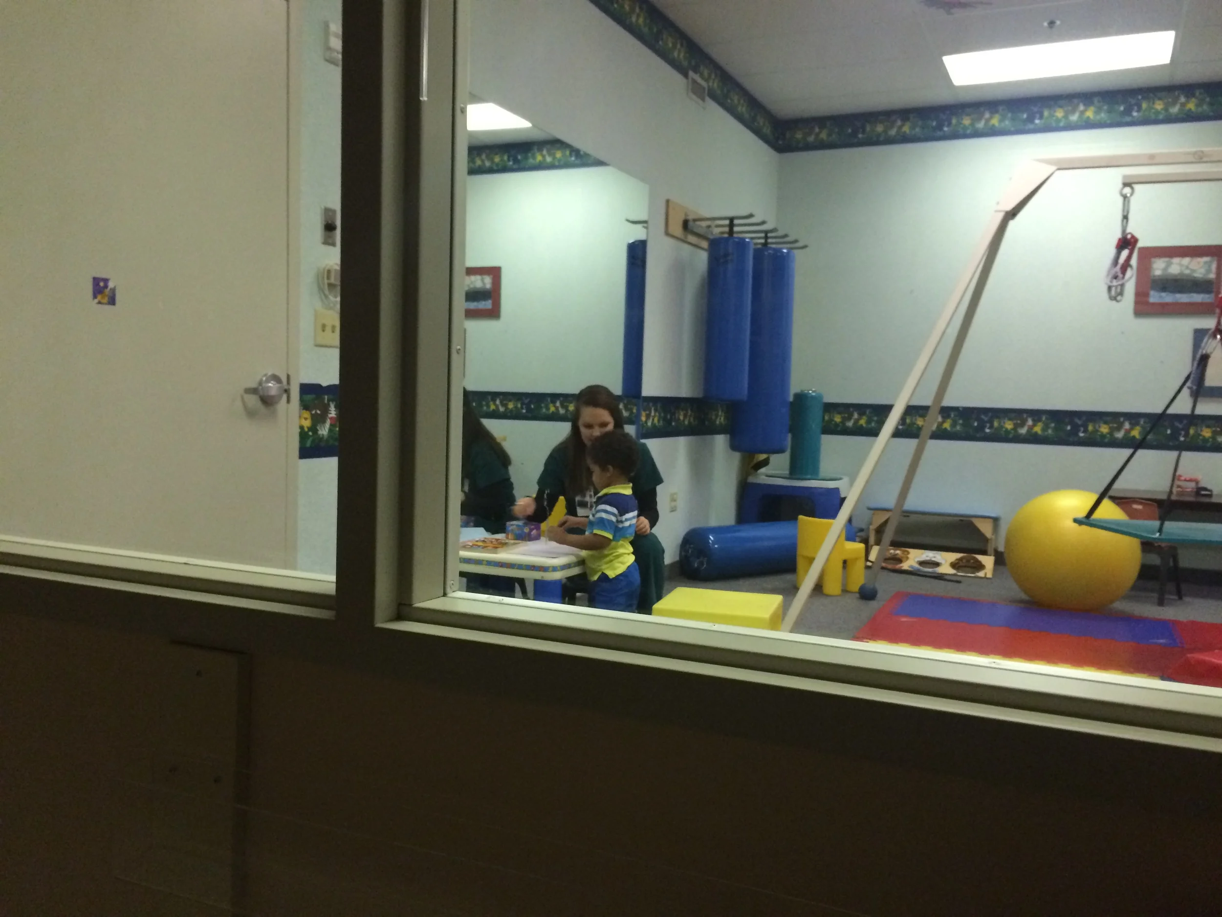 Day 414: I watch Elliott at speech therapy through a one-way mirror