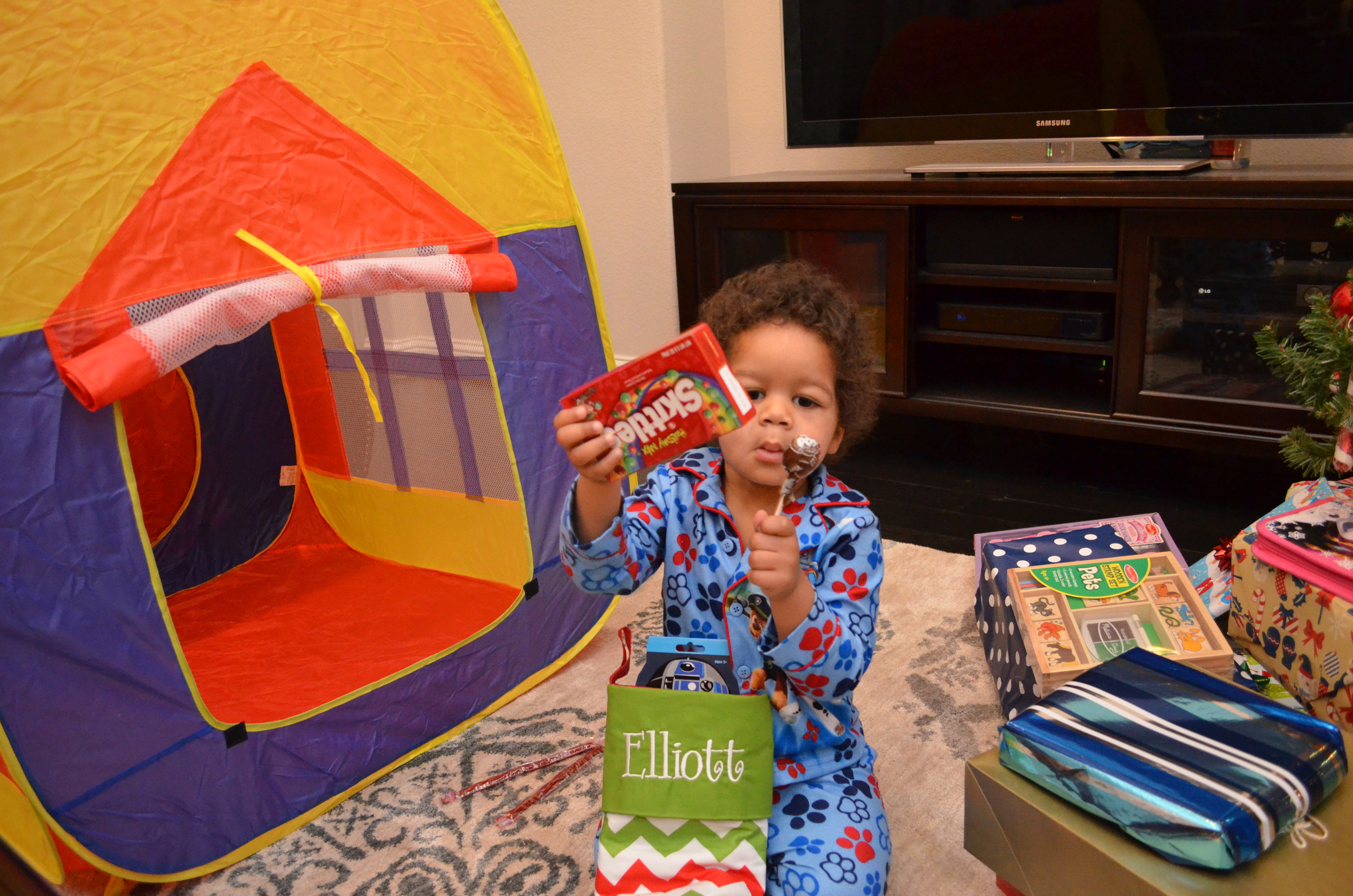 Day 520: Elliott checks out his stocking on Christmas morning.
