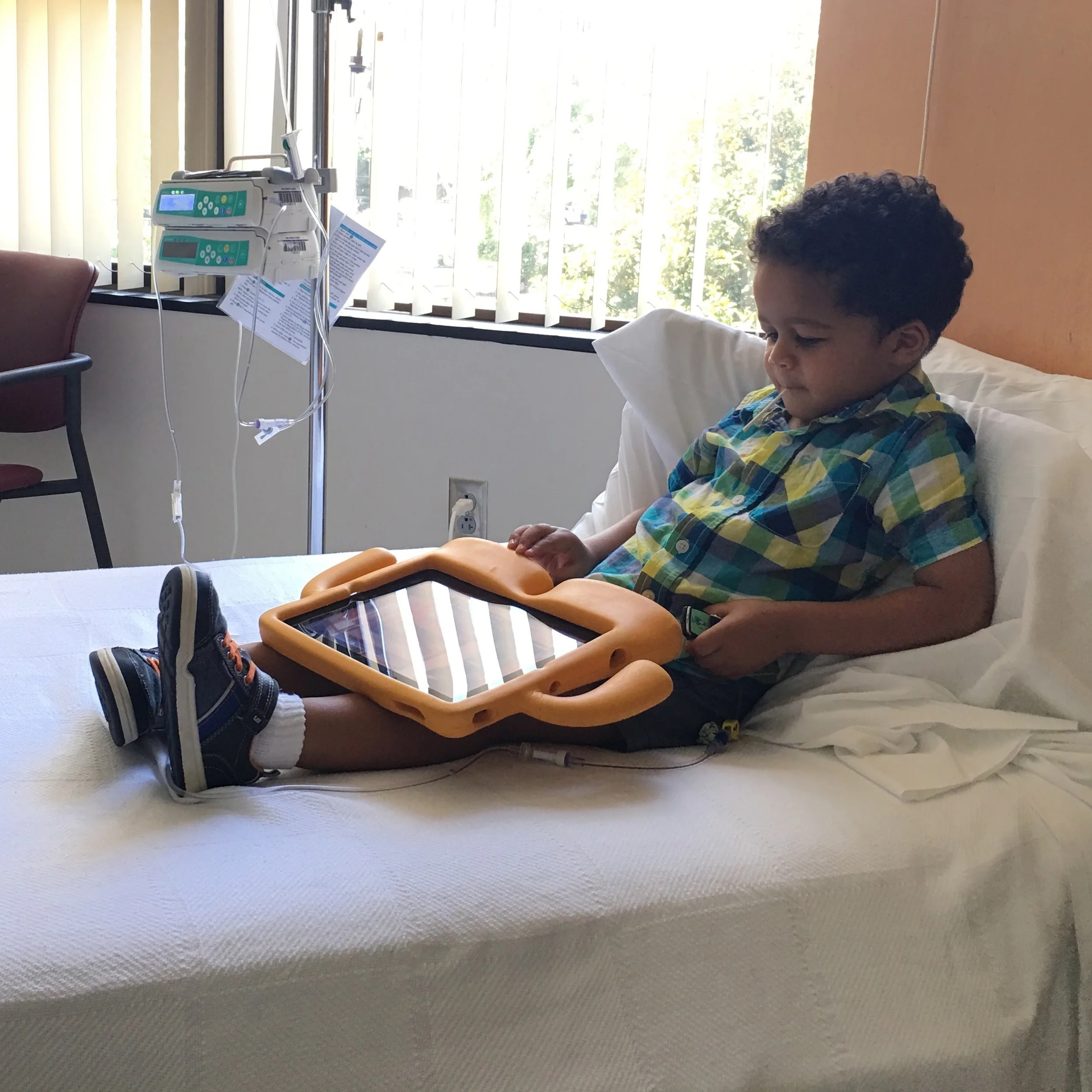 Day 725: Elliott watches Zootopia while the clinic.