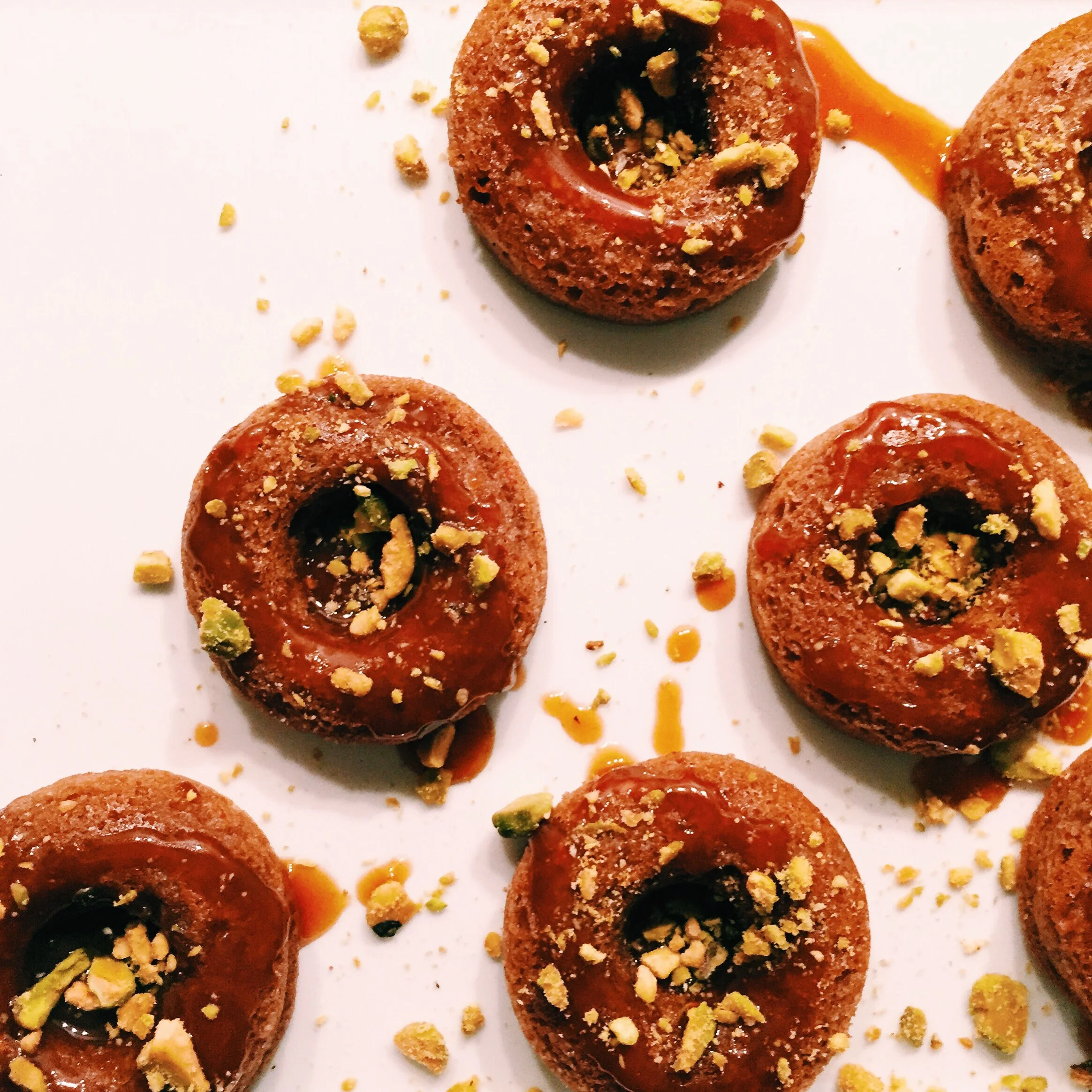 raspberry mini-donuts with pistachio and grey sea salt caramel