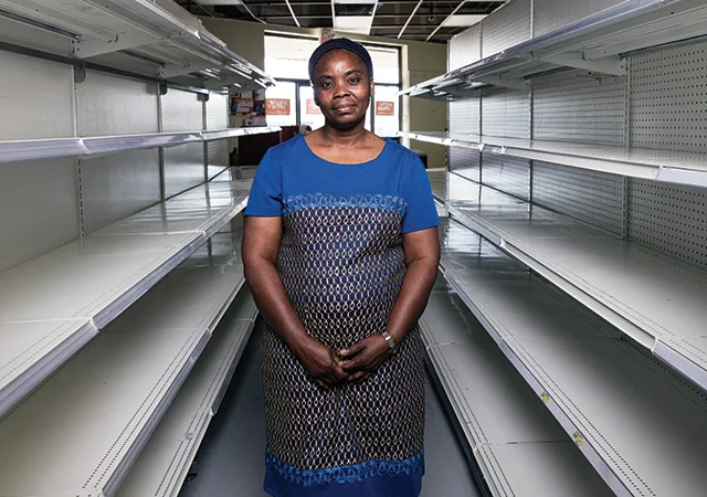 After the fire, Funmi Baiyewun, owner of all nations supermarket, had to throw out $172,000 worth of inventory. Photograph Curtis Trent