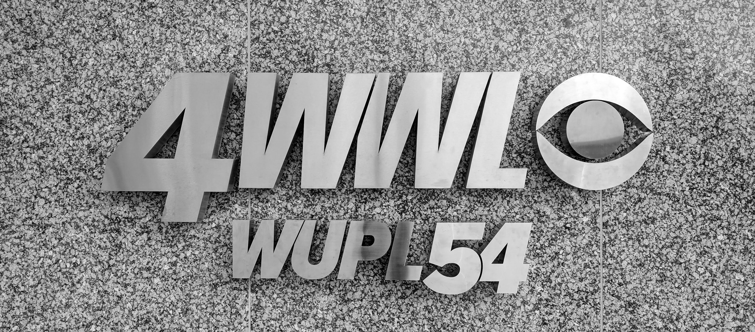 Wall-mounted, floating metal lettering and logo- 4WWL WUPL54