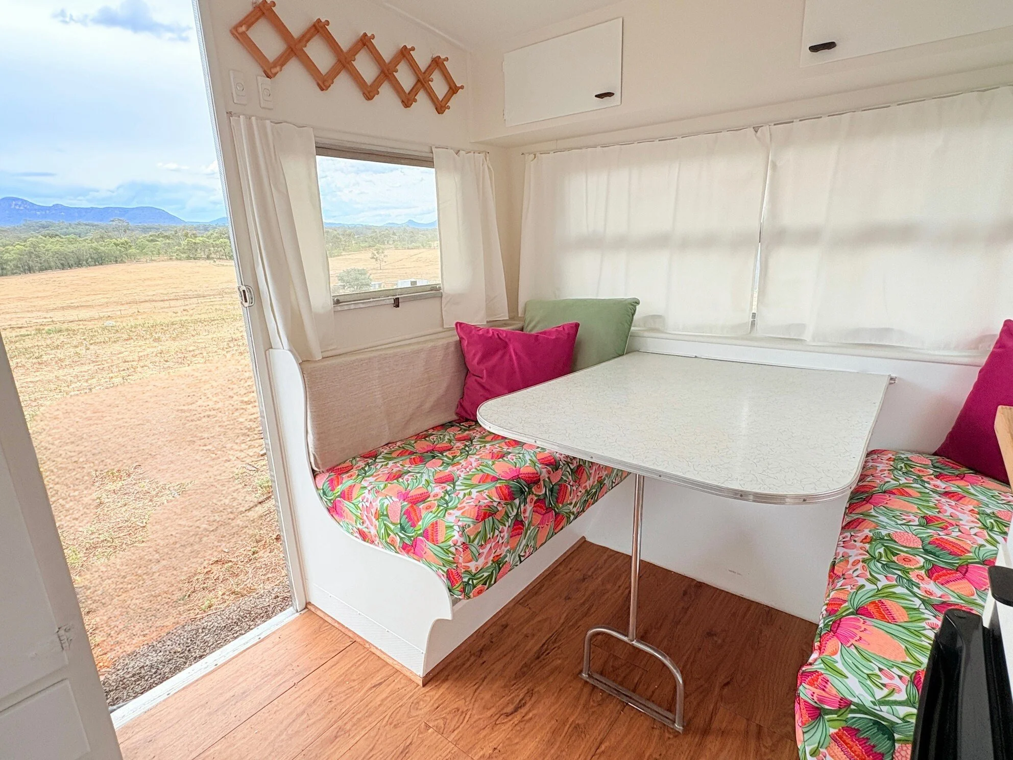 View out of Caravan door and across eating area in Capertee Valley