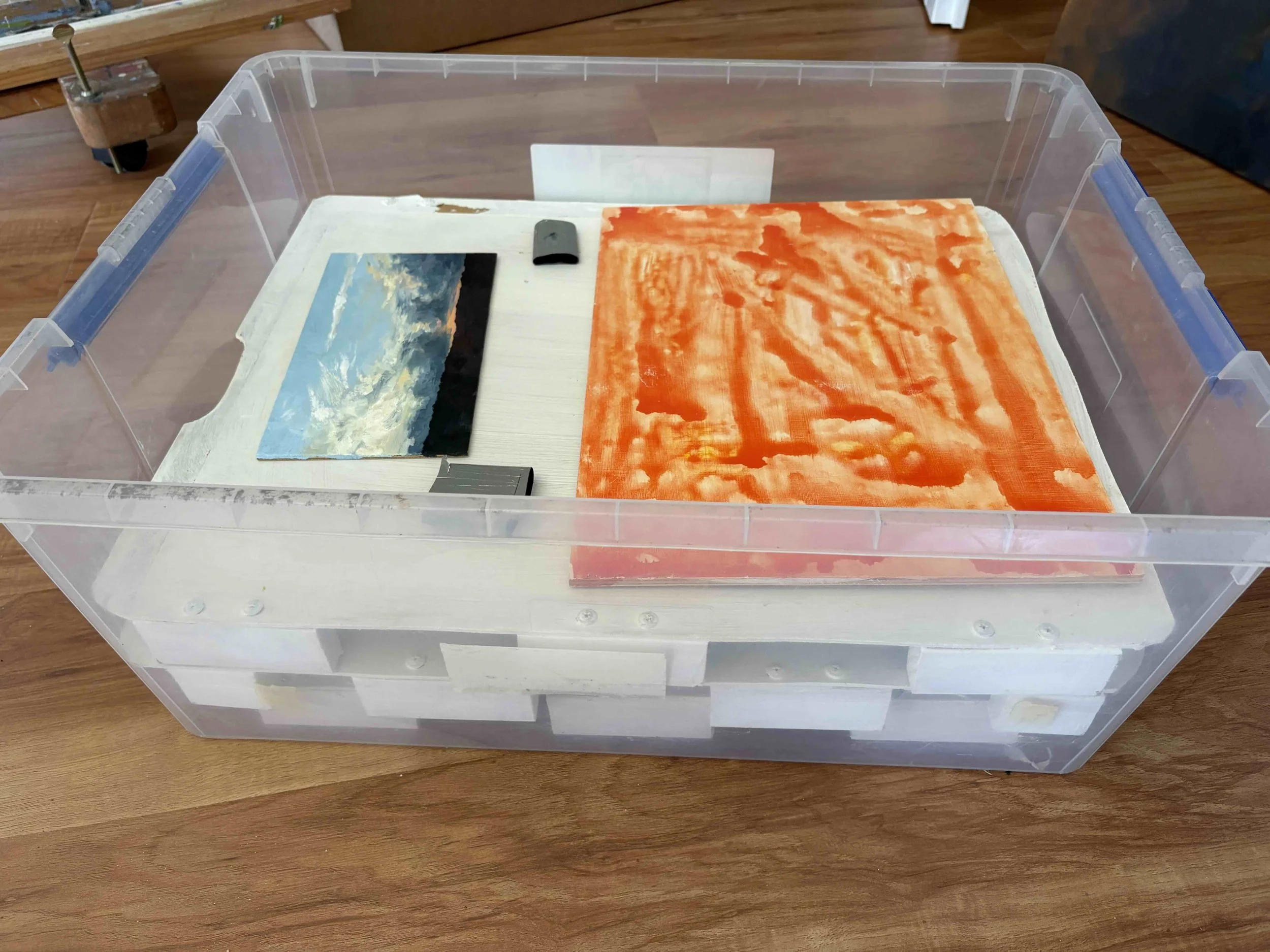 A box system I use for storing wet oil paintings on the road.