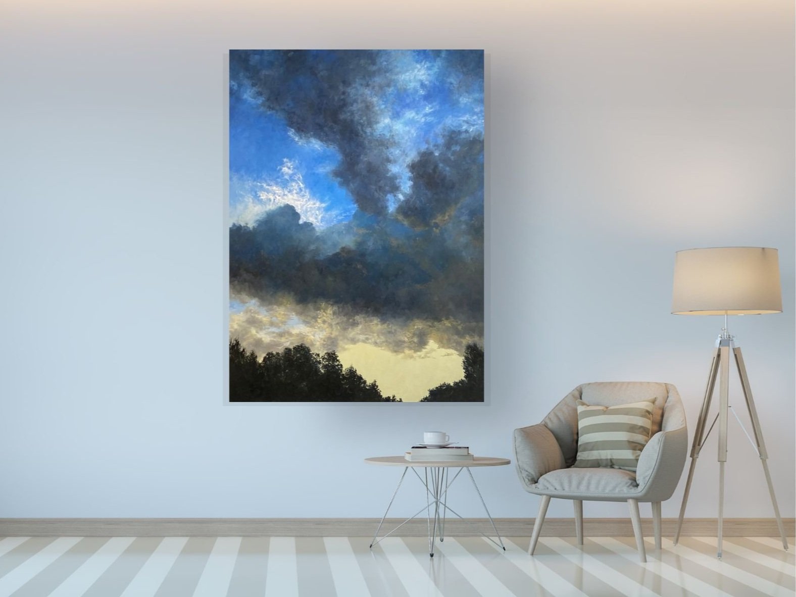 Contemporary home living space in neutral colours with chair, lamp, side table and large sky landscape painting on wall in blue, yellow, indigo and grey