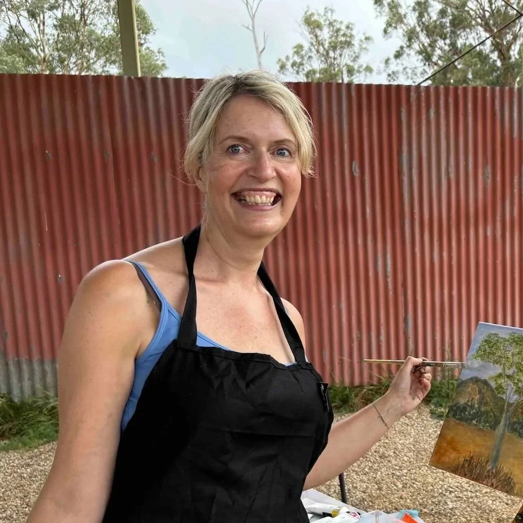 Retreat participant at Capertee with landscape painting