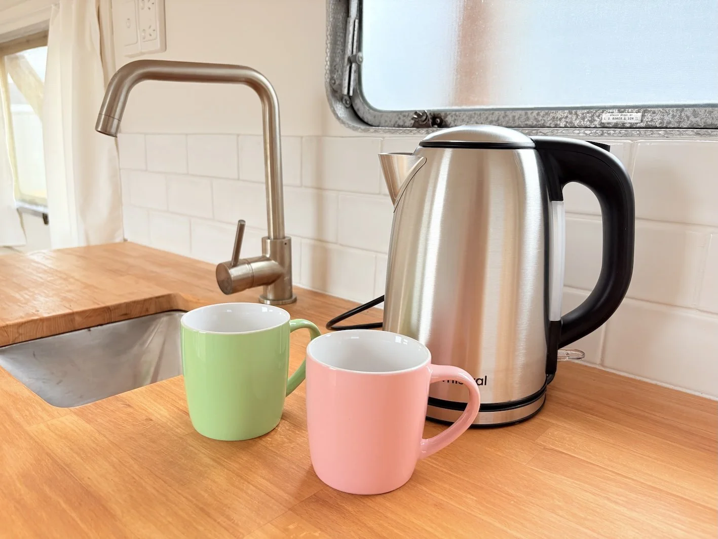 Kitchen of restored vintage caravan in Capertee Valley retreat centre