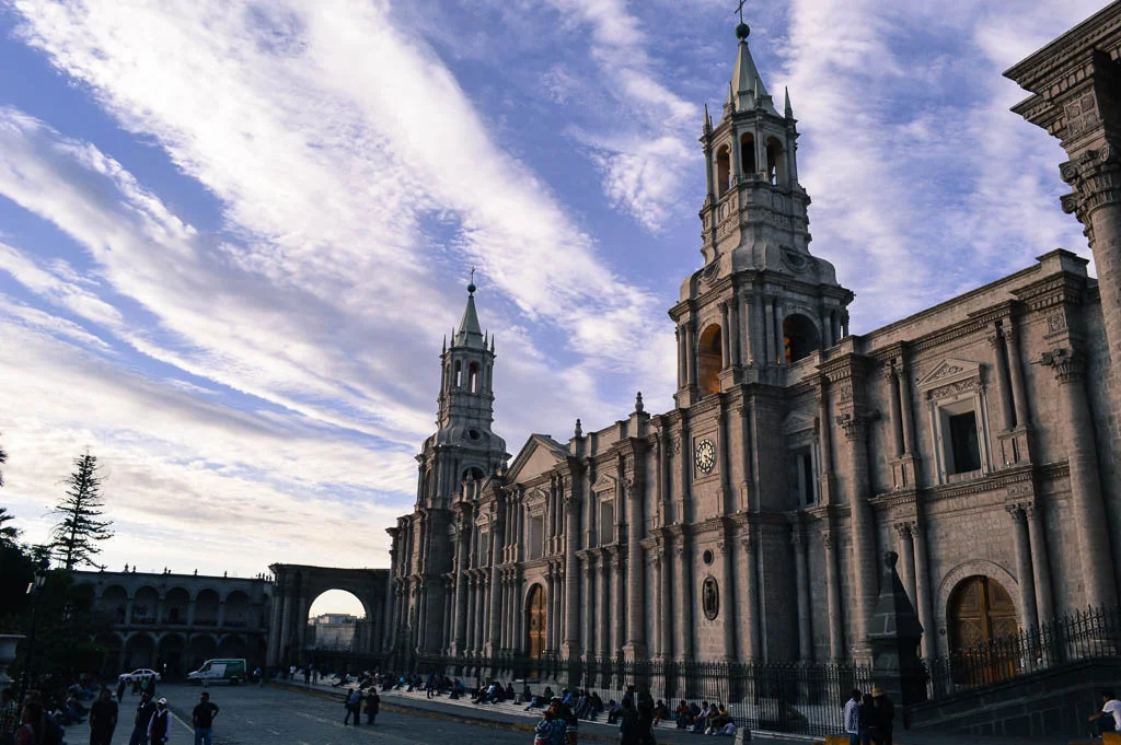 A side view of the Cathedral of Arequipa at sunset.
