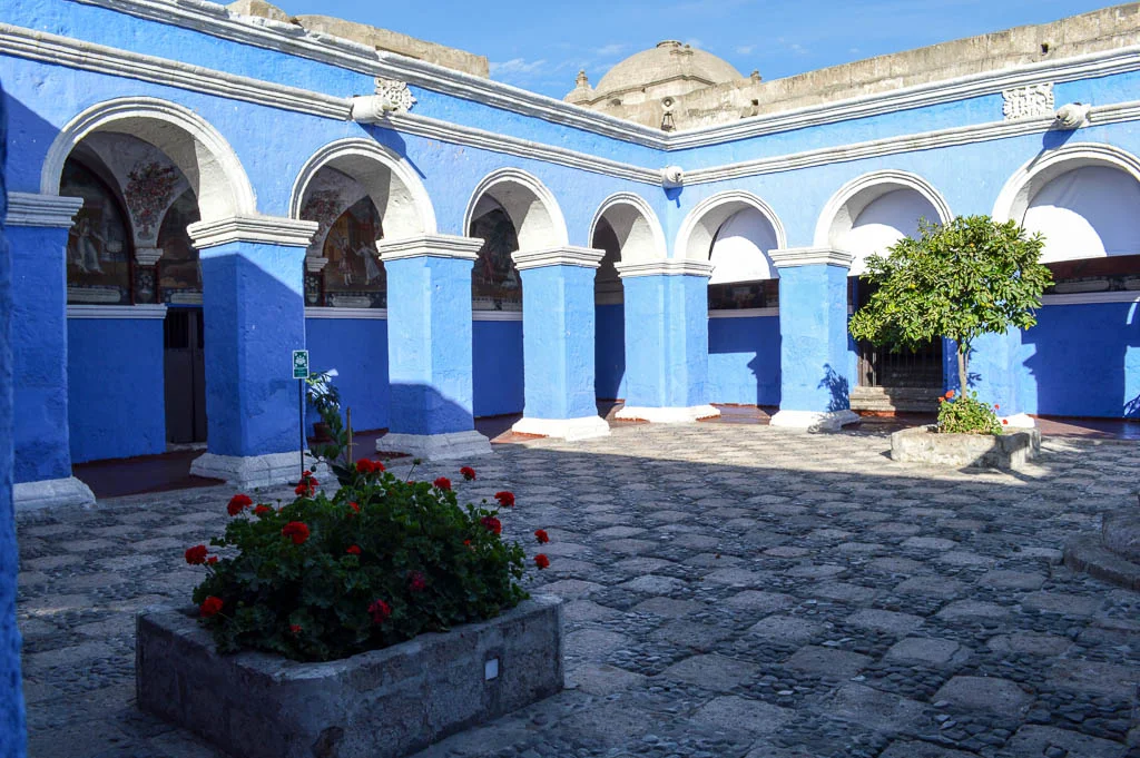 A blue walled square in the Monasterio de Santa Catalina in Arequipa Peru