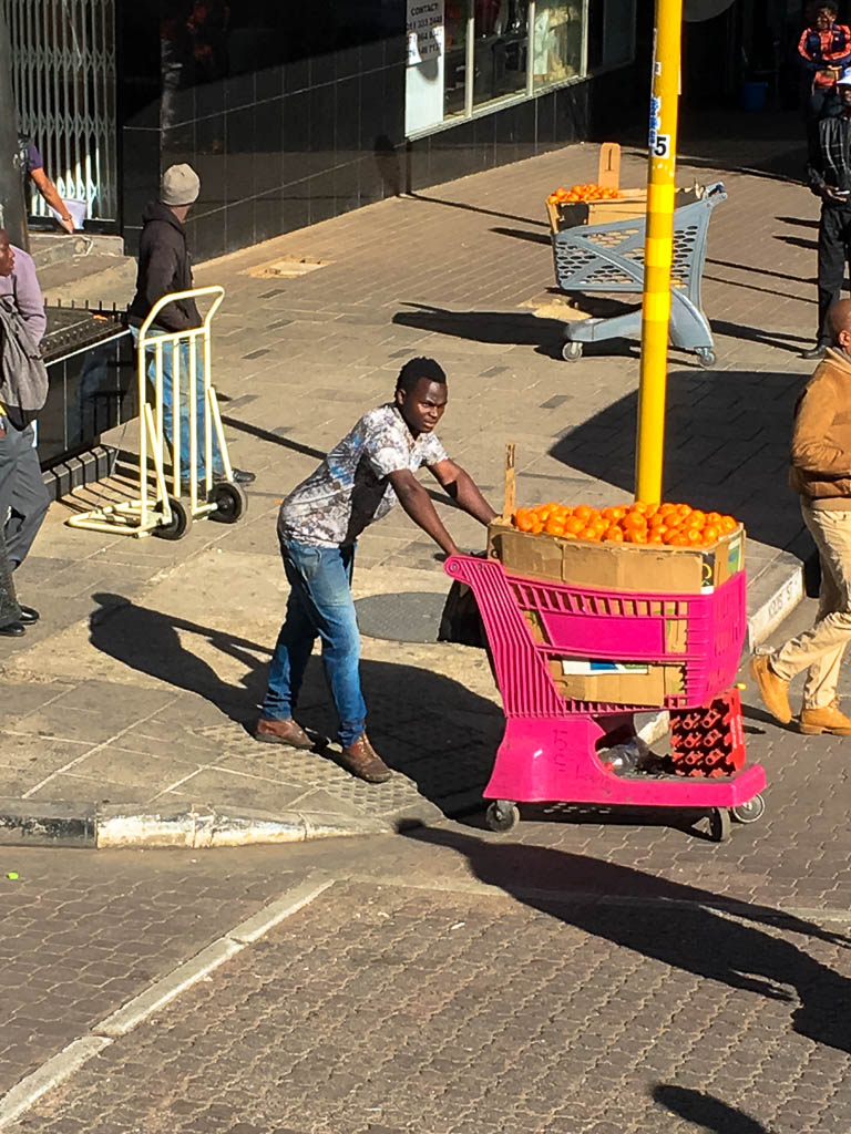 A Hawker selling oranges in JHB