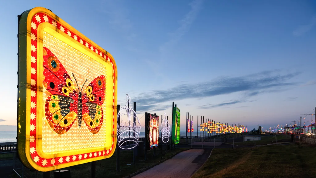One of the butterfly Blackpool Illuminations installments at sunset in Blackpool.