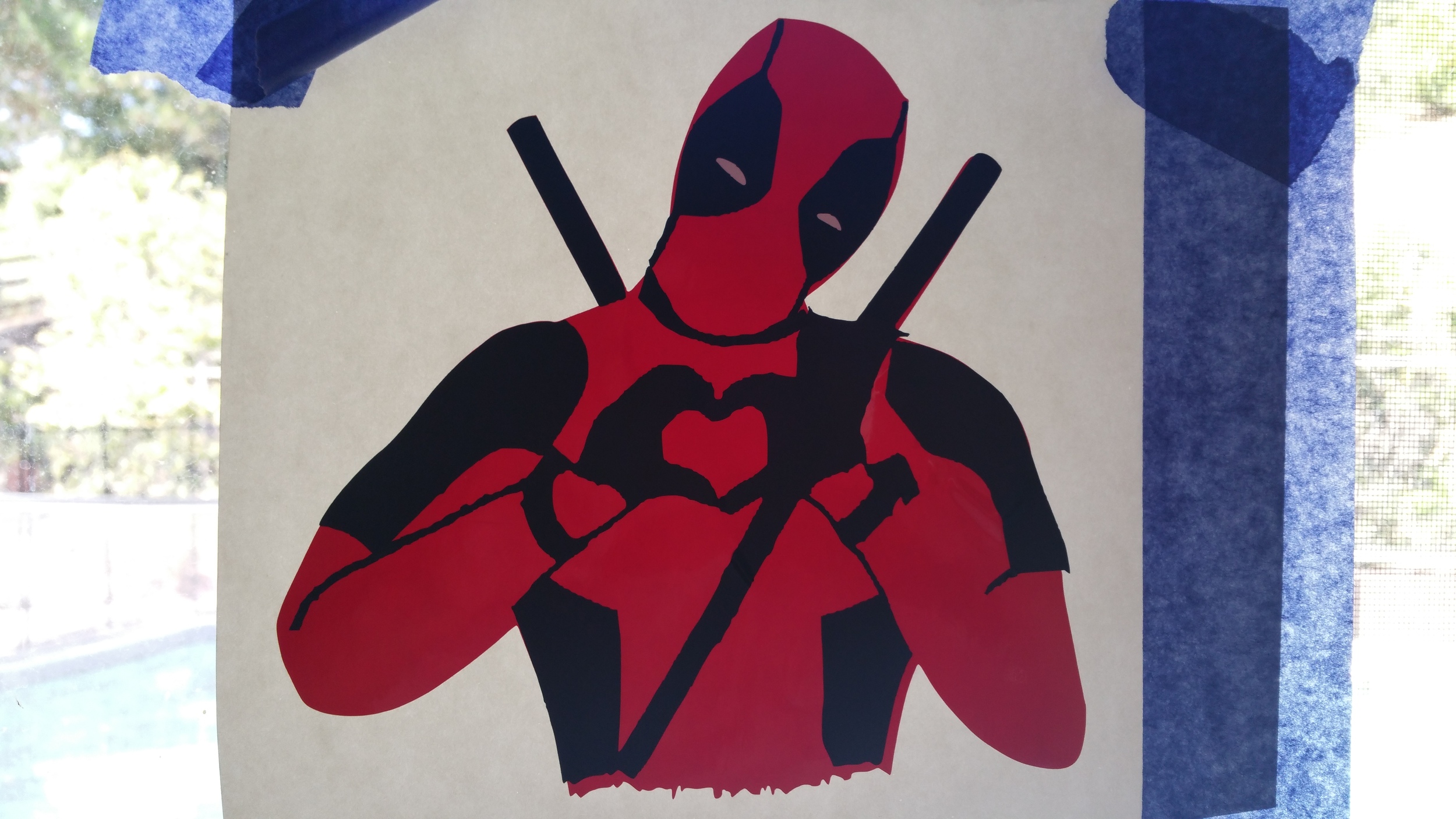 3 layer sticker: black atop white eyes atop red background