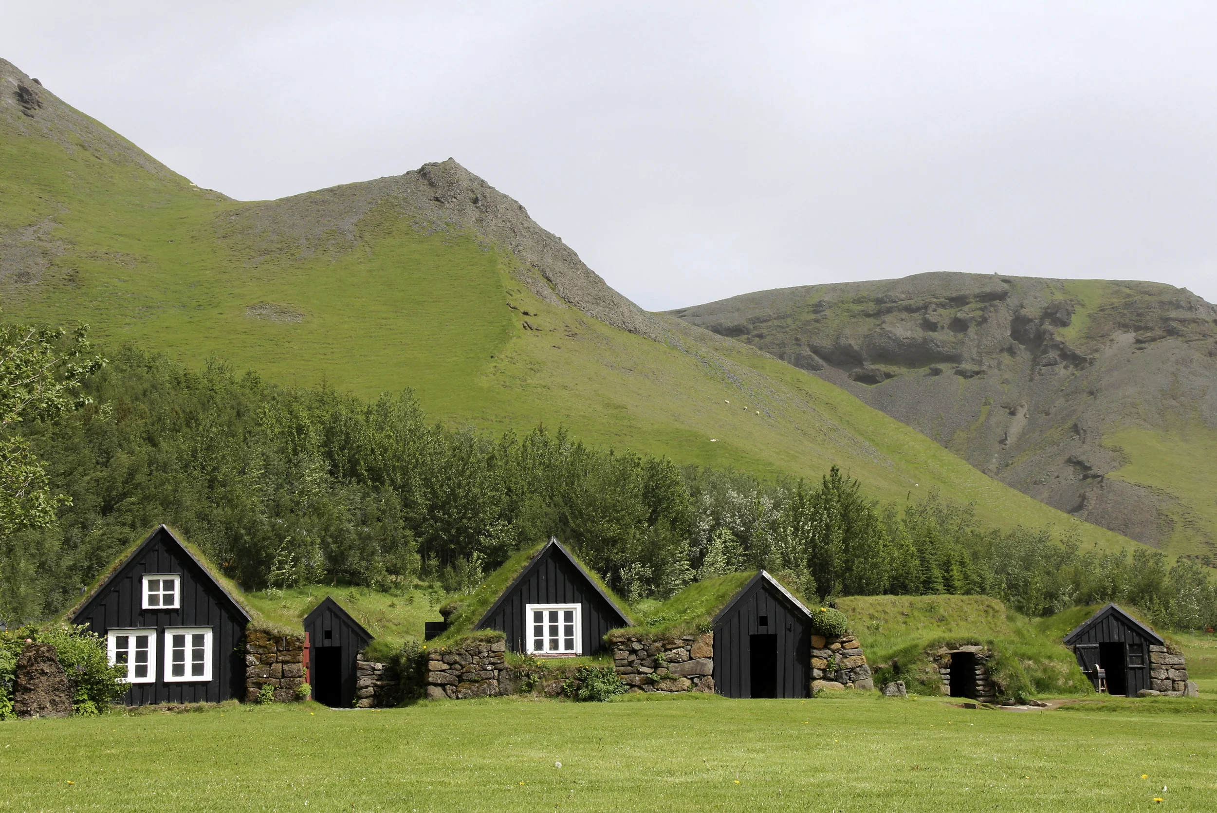 turf house at the skogar folk museum, iceland