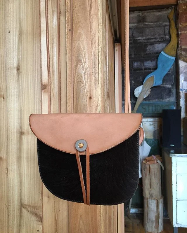 Making way for new things and found two of these here cowhide possible bags with antler tip closures. DM if interested.
