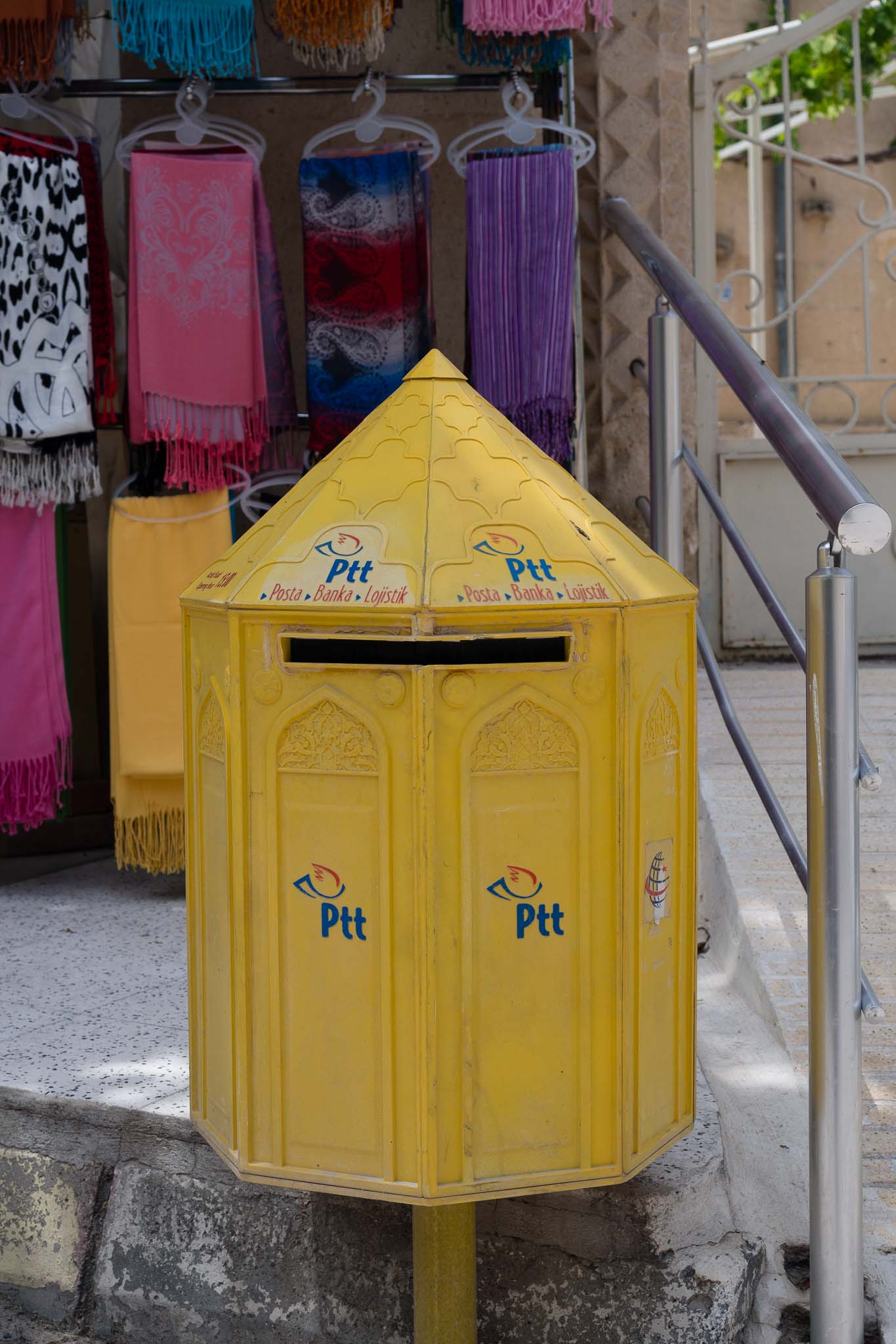 A postal drop box. Not really a bin, unless your letter is rubbish. Colorful nonetheless.