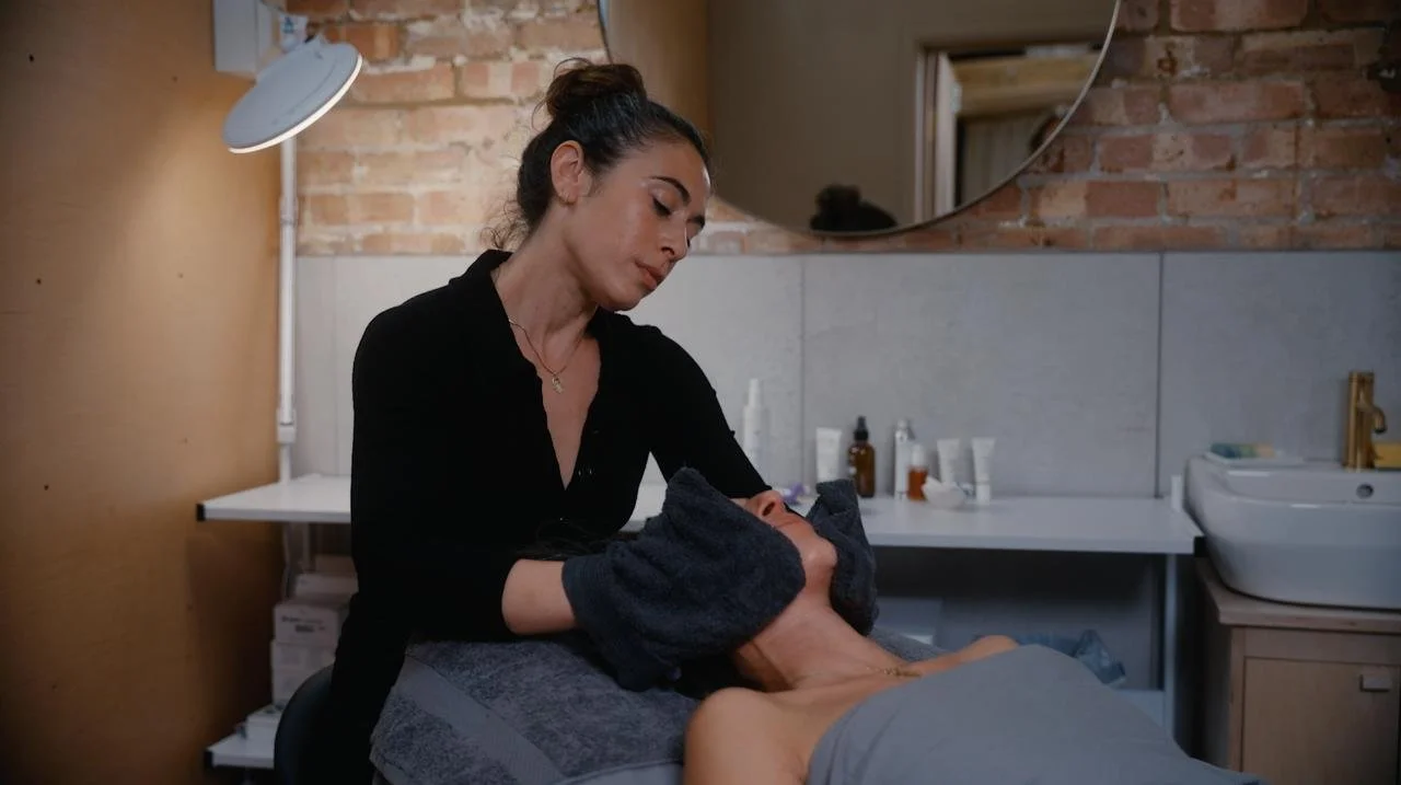 Jodie Abrahams giving a client a facial as part of her skin services that incorporate nutrition and skincare guildance