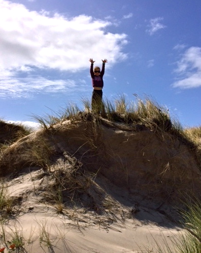 Champion Lucy at the top of a sand dune