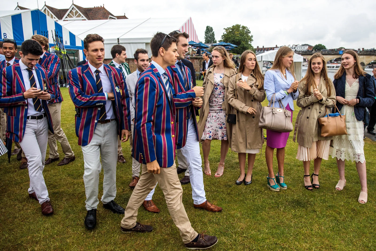 Spectators gather along the bank of the River Thames at the Henley Royal Regatta on June 28, 2017 in Henley-on-Thames.