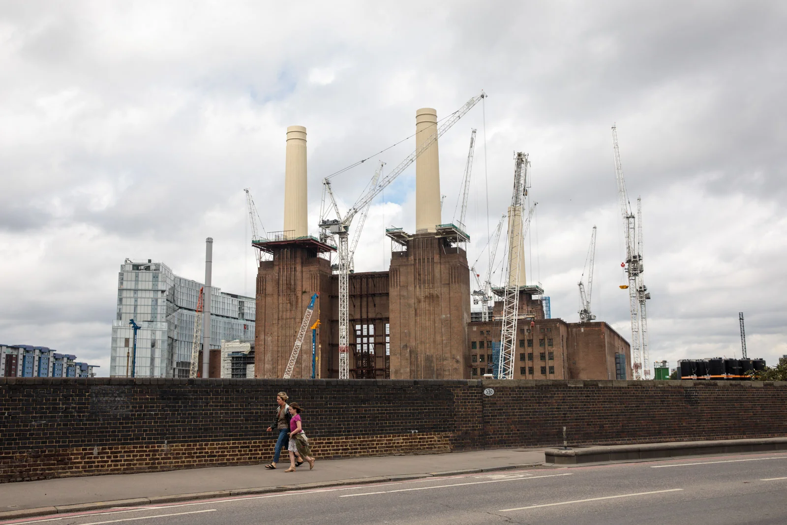 Cranes tower over the Battersea Power Station development July 21, 2017 in London.