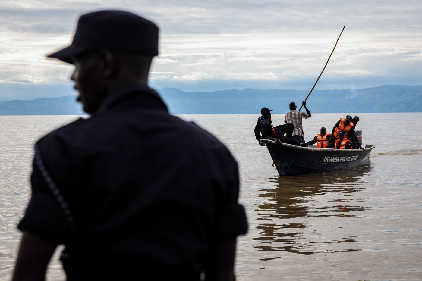  SEBAGORO, UGANDA: Ugandan Police respond to reports of a refugee from the Democratic Republic of Congo drowning during a crossing over Lake Albert by a UNHCR landing site on April 6, 2018. 