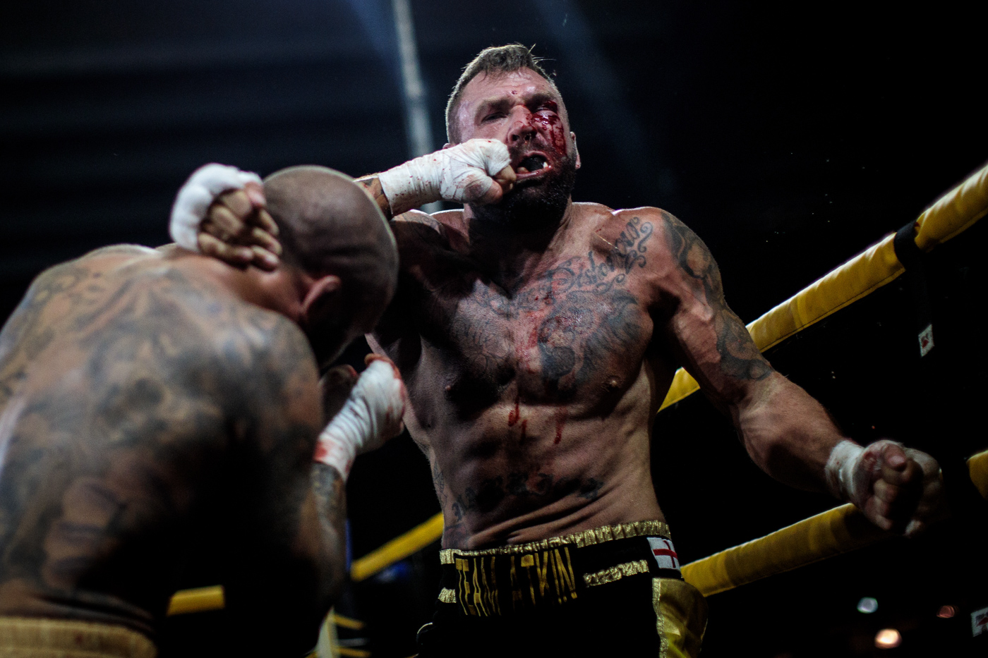 MANCHESTER, ENGLAND: Two-time World Bare-Knuckle Boxing Champion Luke Atkin, age 30 from York is hit by Dom Clark, 35 from Bournemouth during the Rogue Elite world title fight at an Ultimate Bare Knuckle Boxing (UBKB) event at Bowlers Exhibition Centre on August 4, 2018.