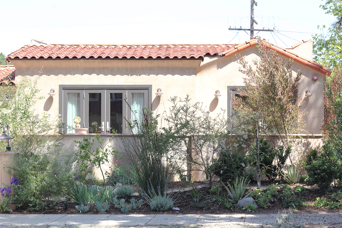  Selective re-planting of a front yard with native and Mediterranean plants. 