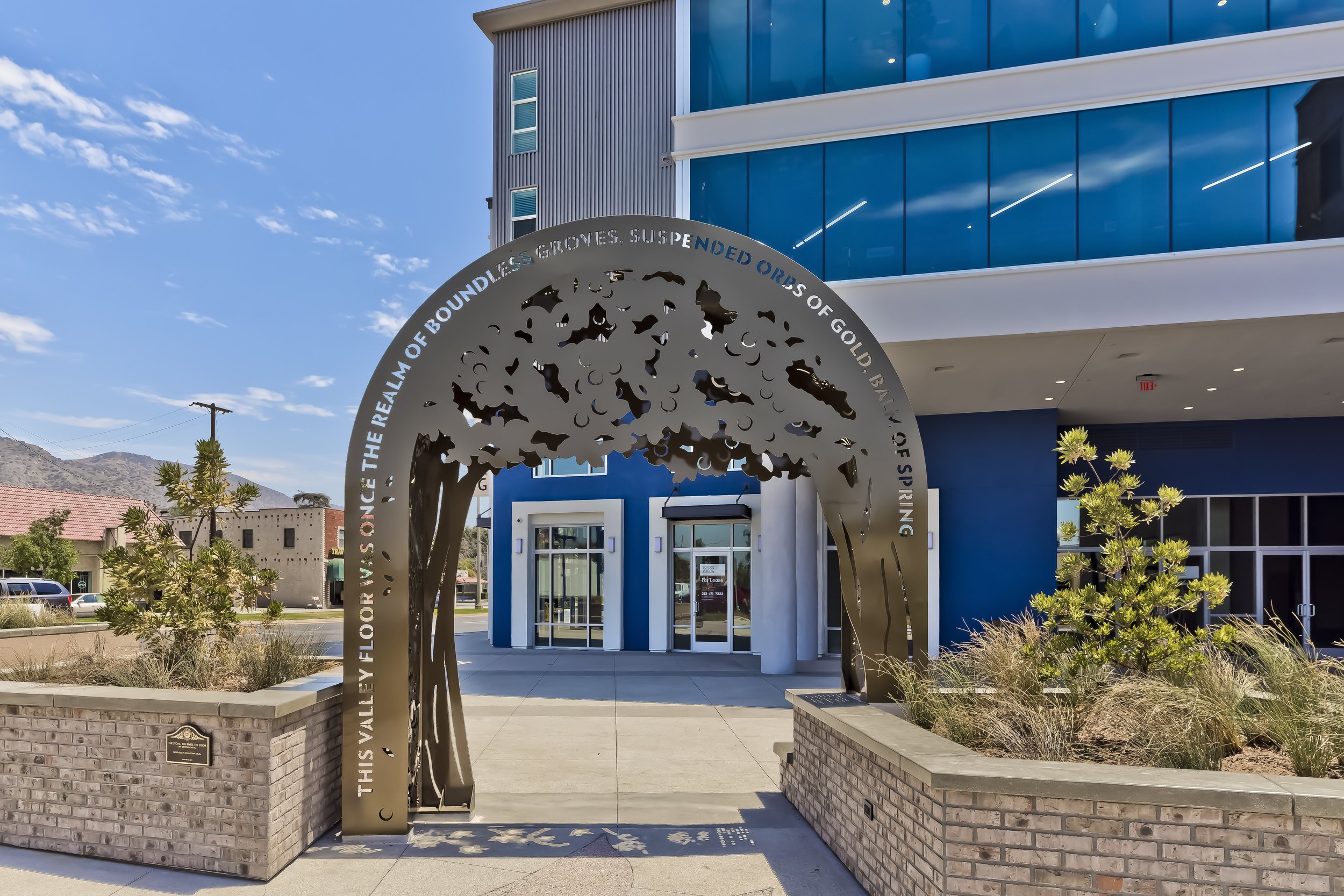  The Stone, the River, the Door  Public art commission for mixed-use development in downtown Azusa  An arched doorway acting as a passage through time, a portal. Drawing inspiration from the history of the area and the name of the development “The Or