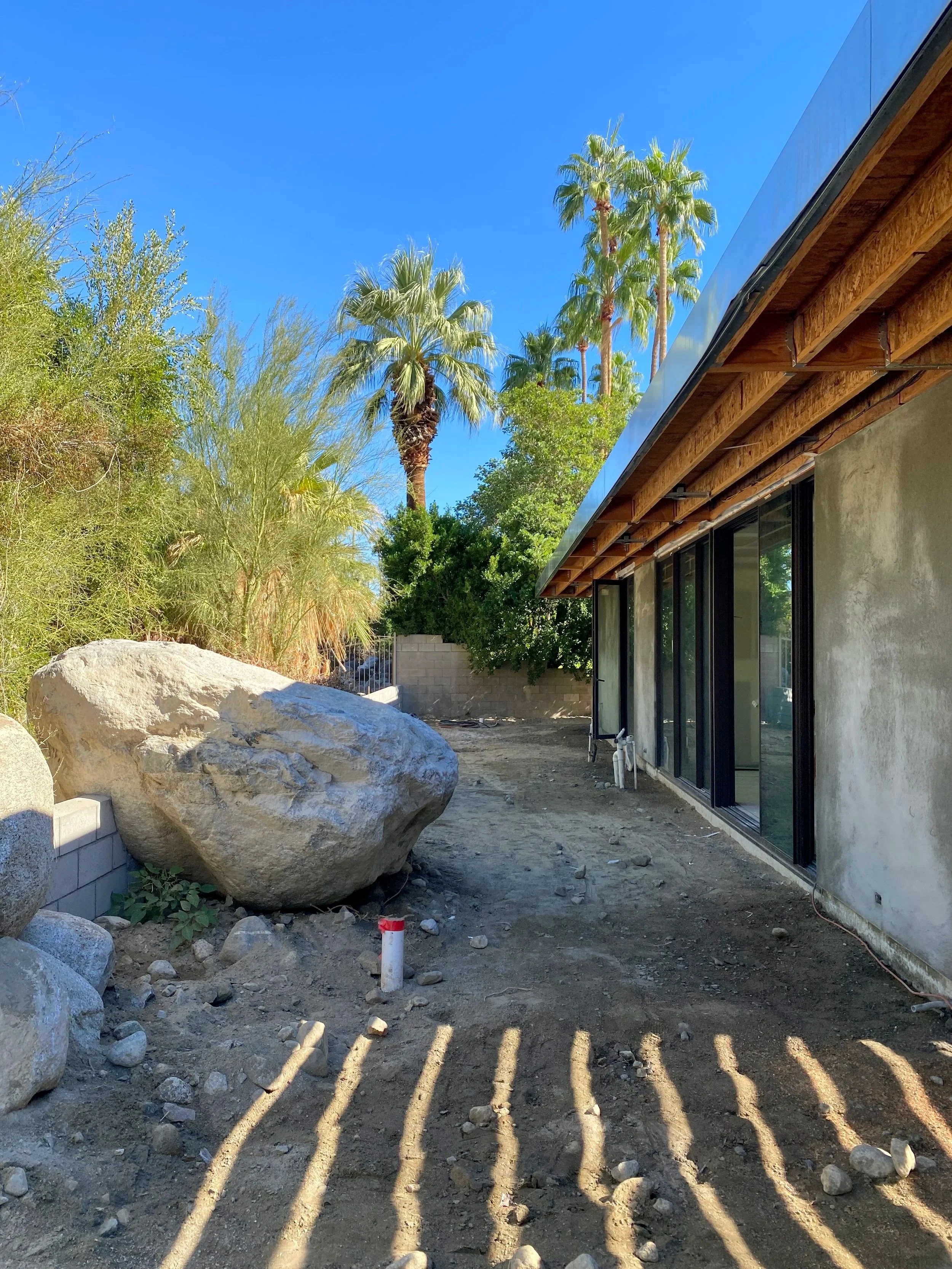 ...and working with the boulders still on site