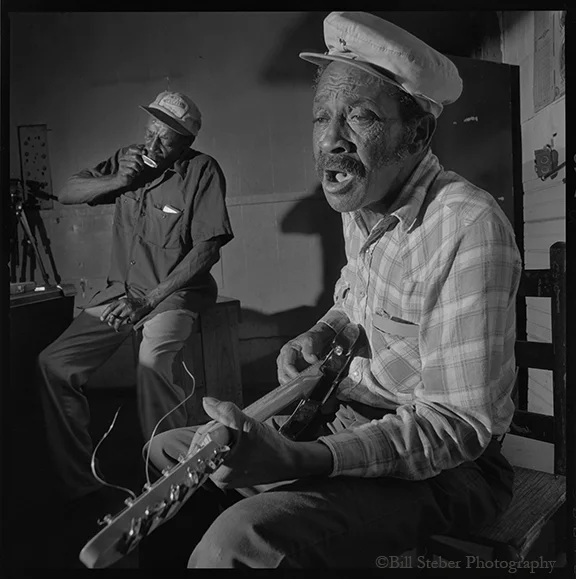 Guitarist Tommy Lee West and harmonica player Cleo Pullman play at Blue Front Cafe in Bentonia, MS, owned by Jimmy "Duck" Holmes. The Blue Front Cafe is the oldest continuously-operating Juke Joint in the state of Mississippi. 