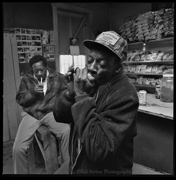 Harmonica player Cleo Pullman plays at Blue Front Cafe in Bentonia, MS, owned by Jimmy "Duck" Holmes. The Blue Front Cafe is the oldest continuously-operating Juke Joint in the state of Mississippi. photo by Bill Steber