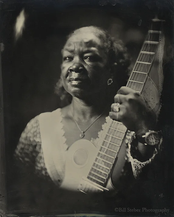 Joann Jones, sister of blues singer Paul "Wine" Jones, at her home Yazoo City, MS. Joann has sung in local blues bands, plays some guitar, and worked for many years at Malaco Records in Jackson.