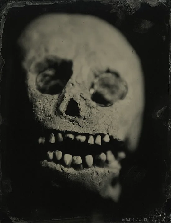 Clay skull with human teeth made by blues musician/folk artist Son Thomas