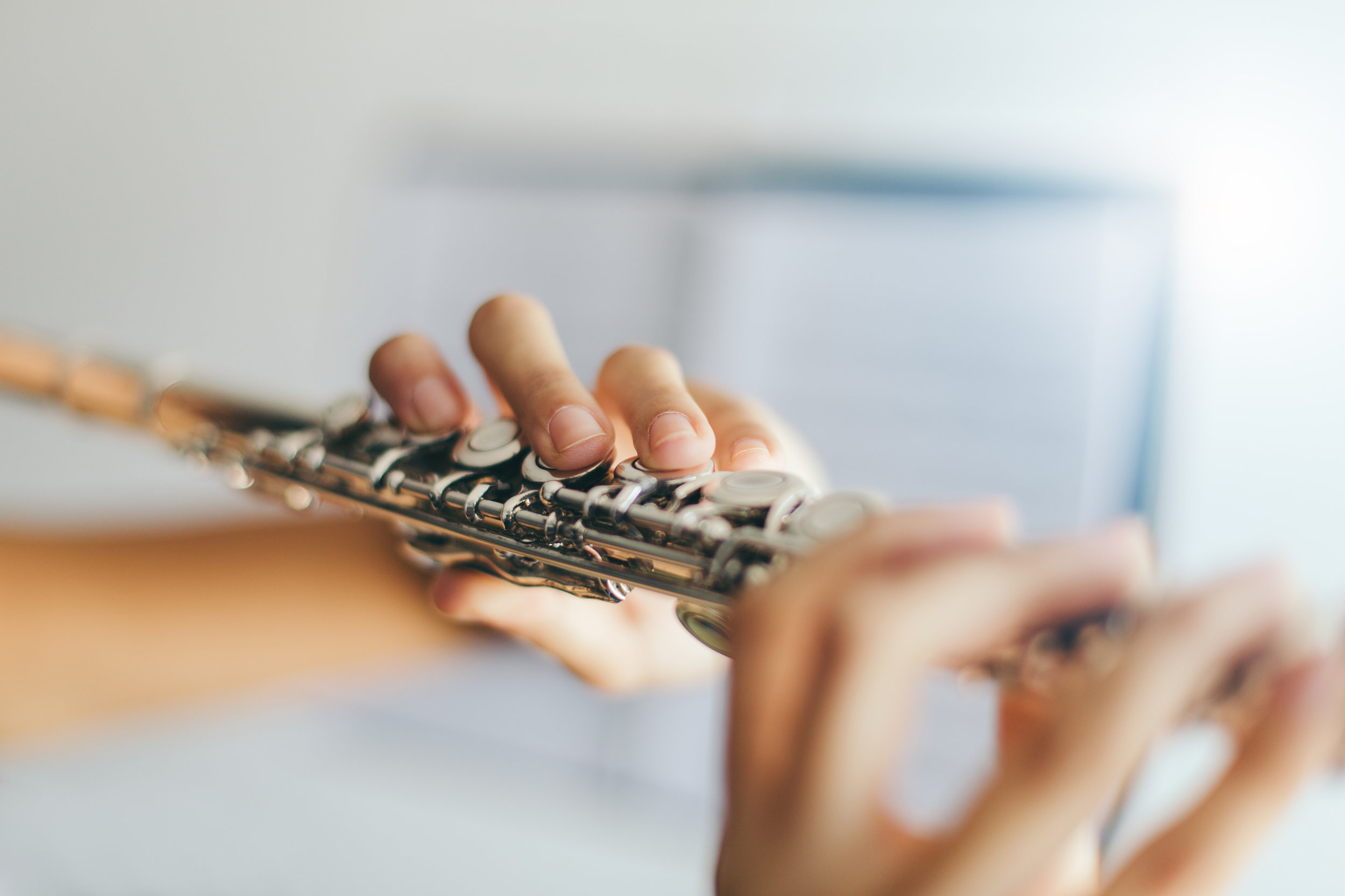 cms stock photo hands on flute.jpg