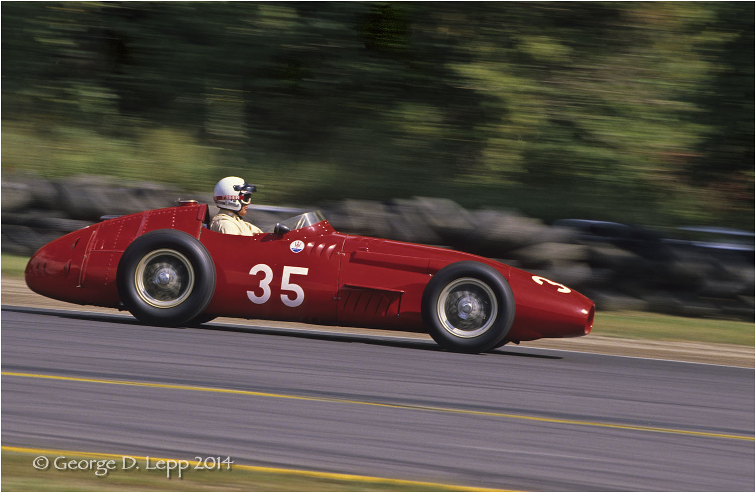 Sterling Moss in a Maserati F1, Vintage Racing, Limerock, CT. © George D. Lepp 2014 T-RA-VI-0005