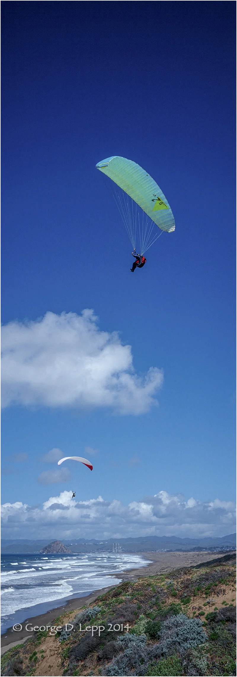 Paraglider along coastline at Montana de Morro, CA. © George D. Lepp 2014 VA-PA-0004