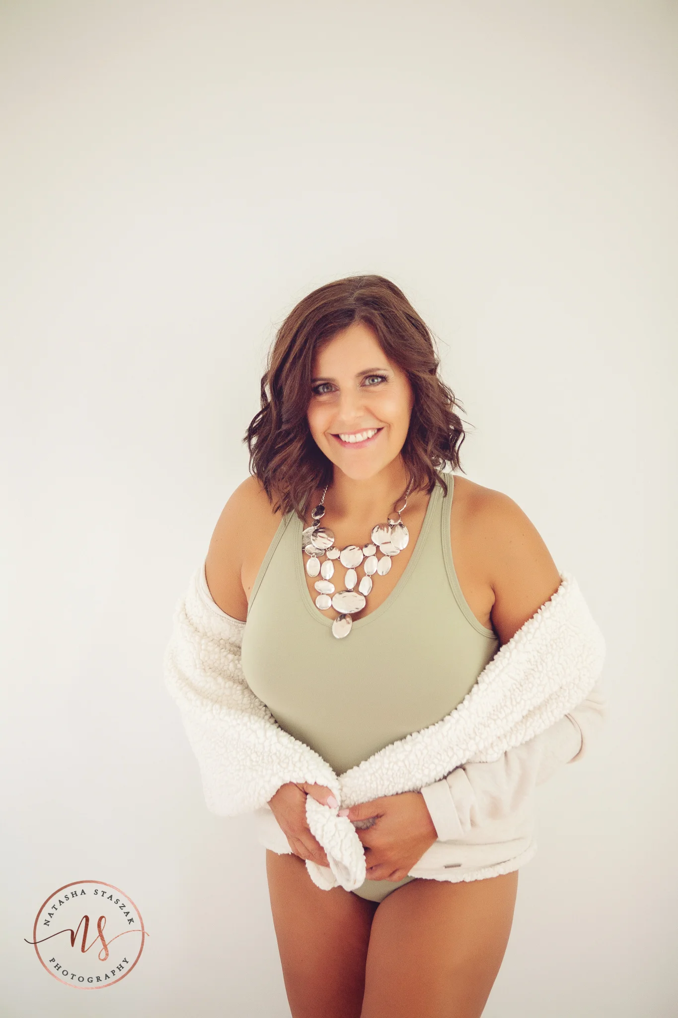 Buffalo Boudoir photo studio Natasha Staszak Photography. Woman with bodysuit and wrap.