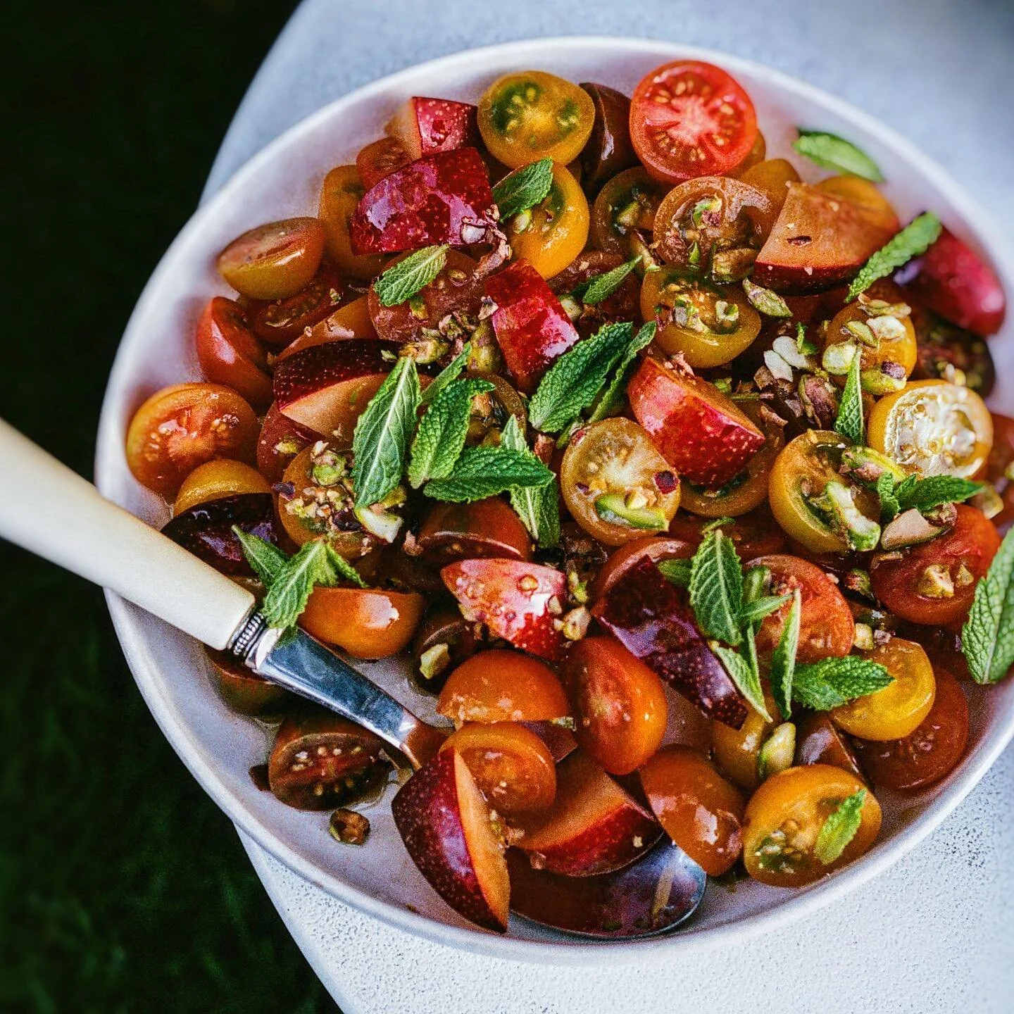 A nice, simple salad 🥗 for this #memorialday weekend - ripe tomatoes and nectarines with pistachio and tender mint leaf 😋 shot on #35mm #kodakektar100 on #nikon35ti #nonrecipe #recipe