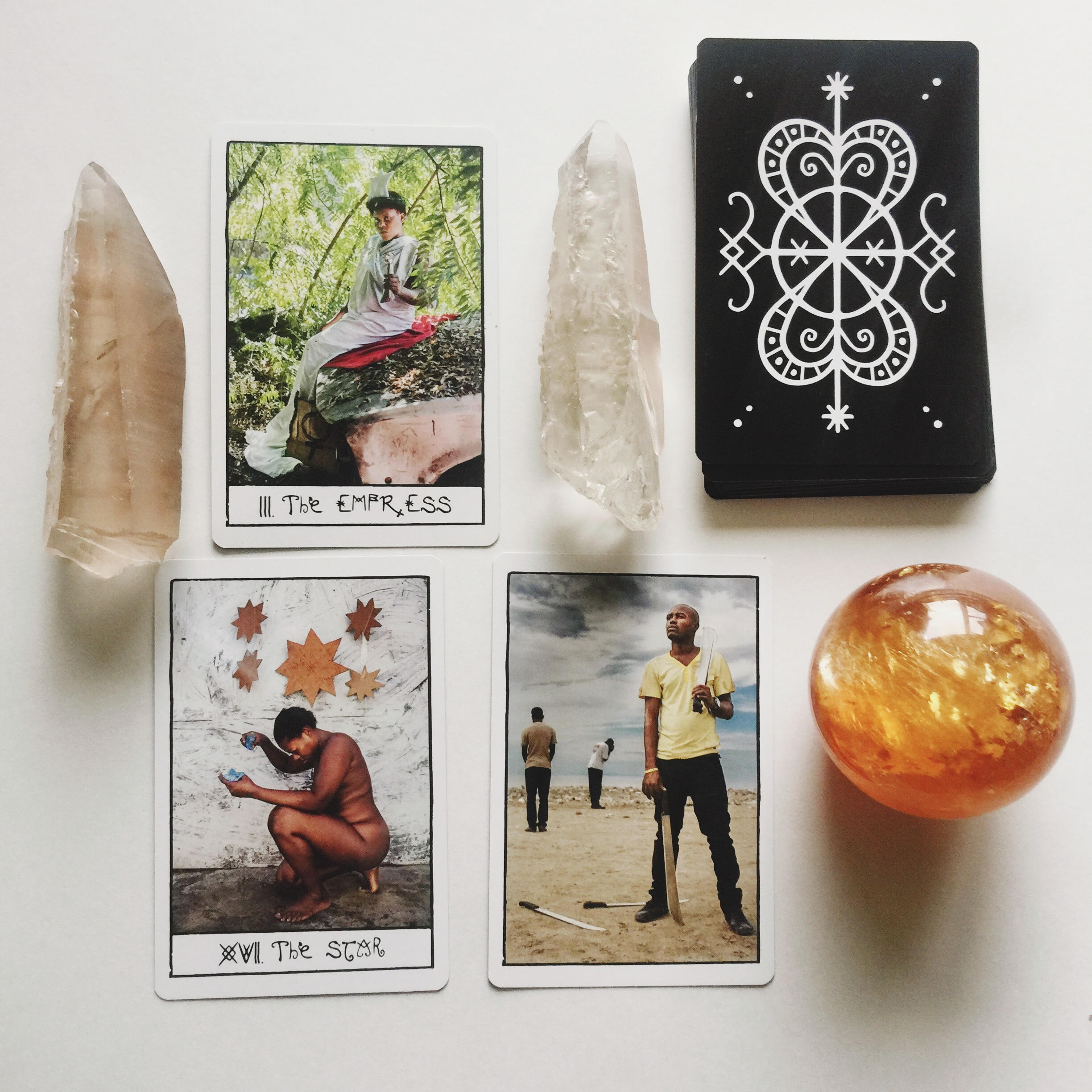 Photo by Bri Luna//The Haitian Tarot Deck featuring: The Empress, The Star, The 5 of Swords